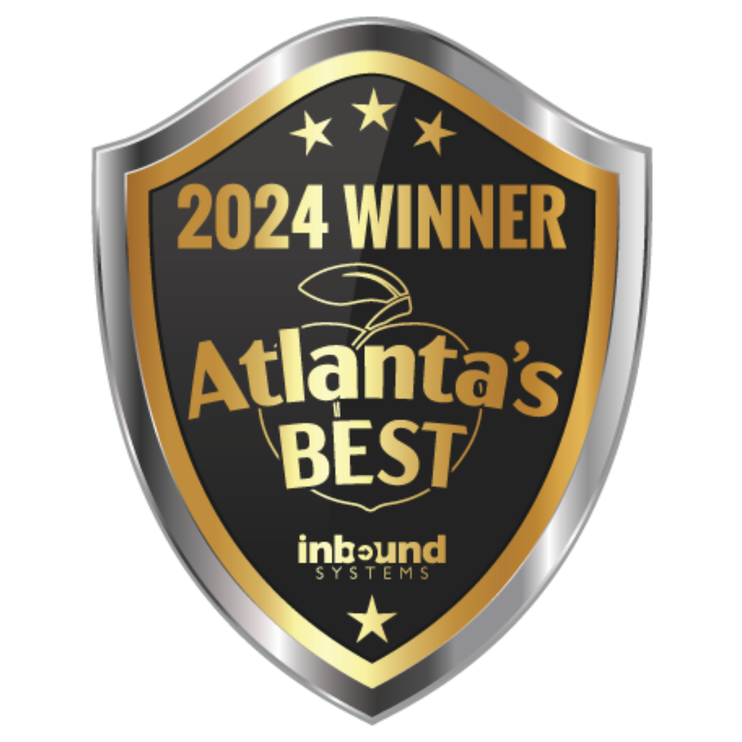 A shield-shaped badge with a black background, gold and silver borders, displaying the text '2024 Winner, Atlantic's Best' and 'Inbound Systems' with a small star at the bottom.