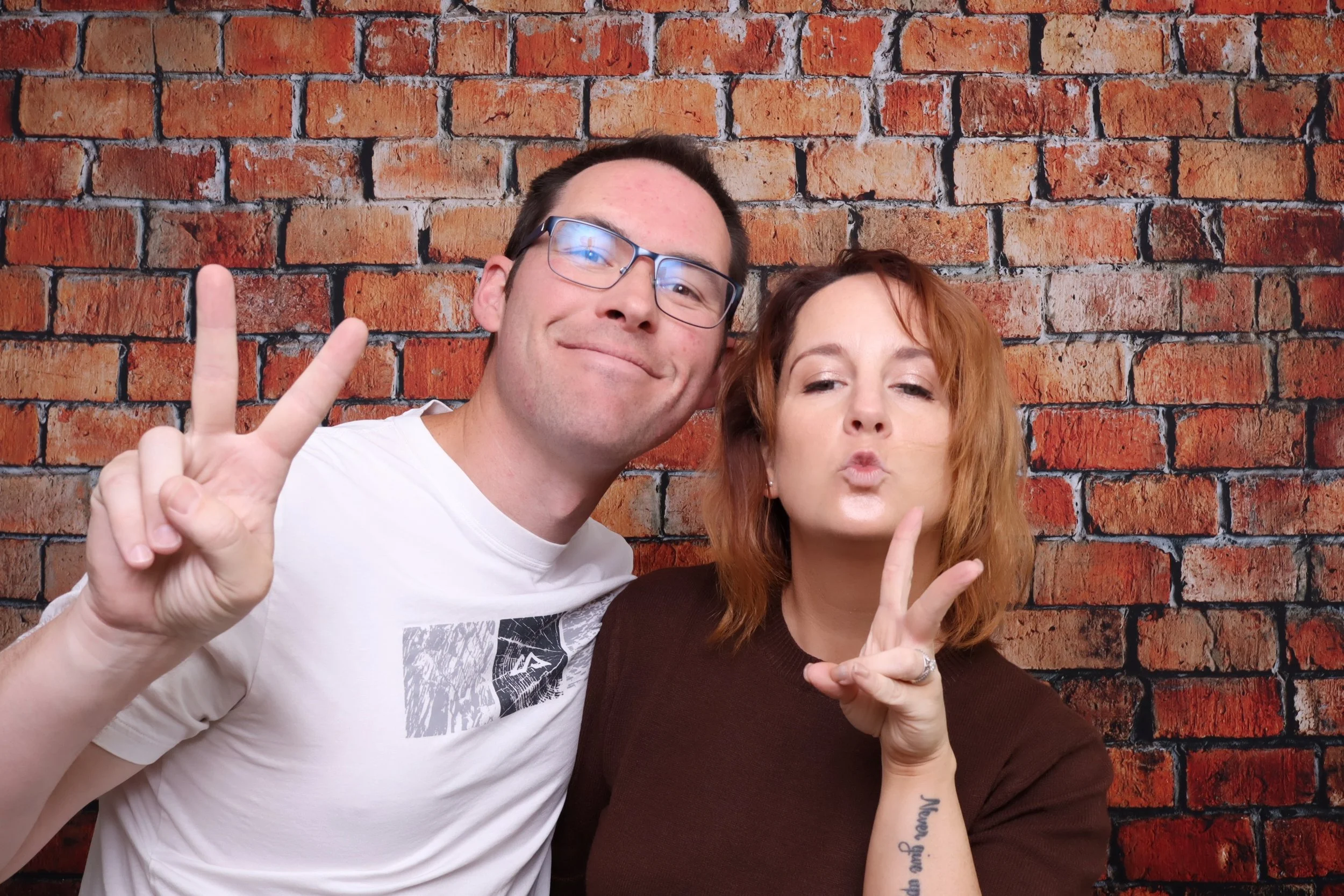 un, playful photobooth setup with backdrop and props for celebrations