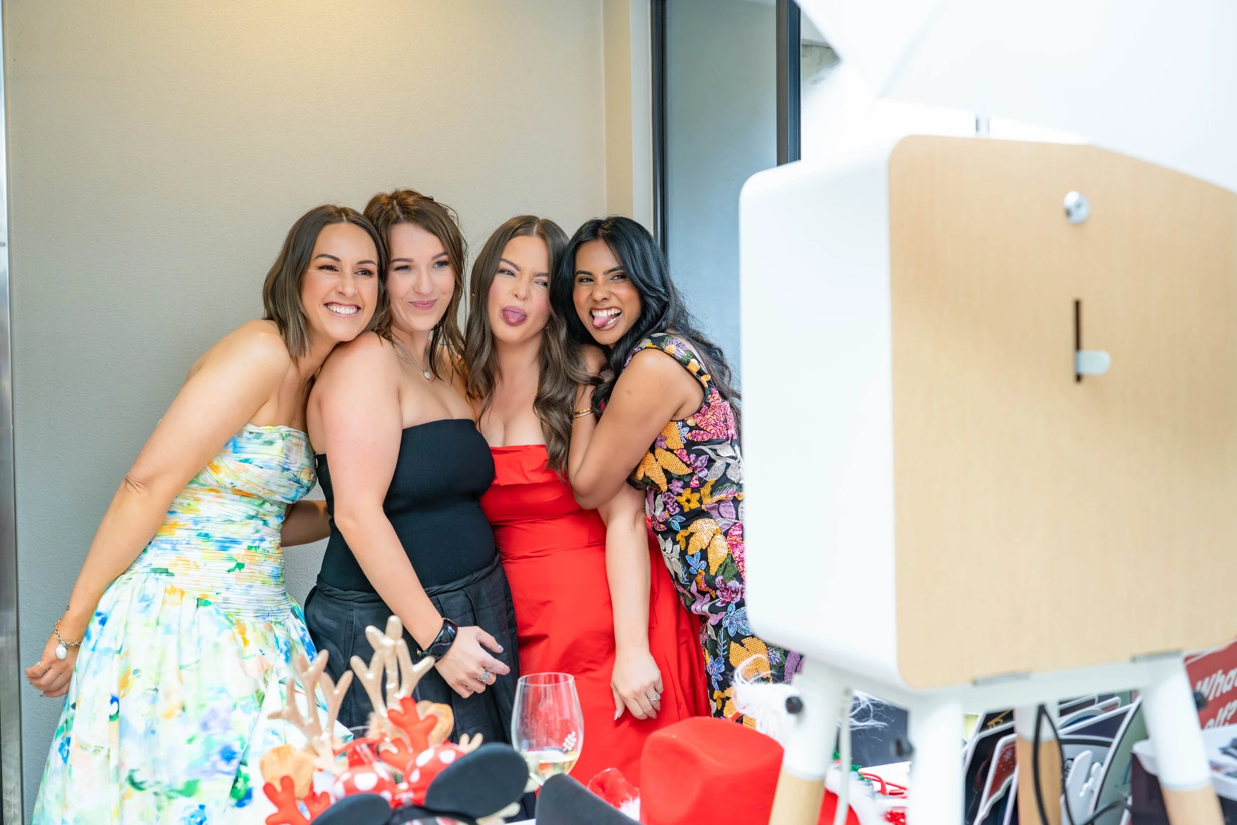 Candid moment of wedding guests at photo booth Melbourne
