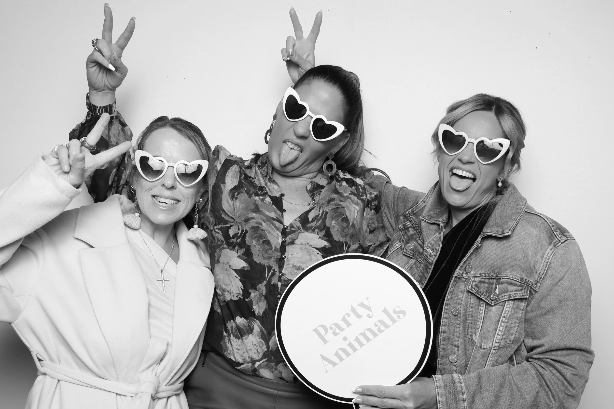 Guests in glamour photo booth Melbourne wedding, skin-smooth black and white filter