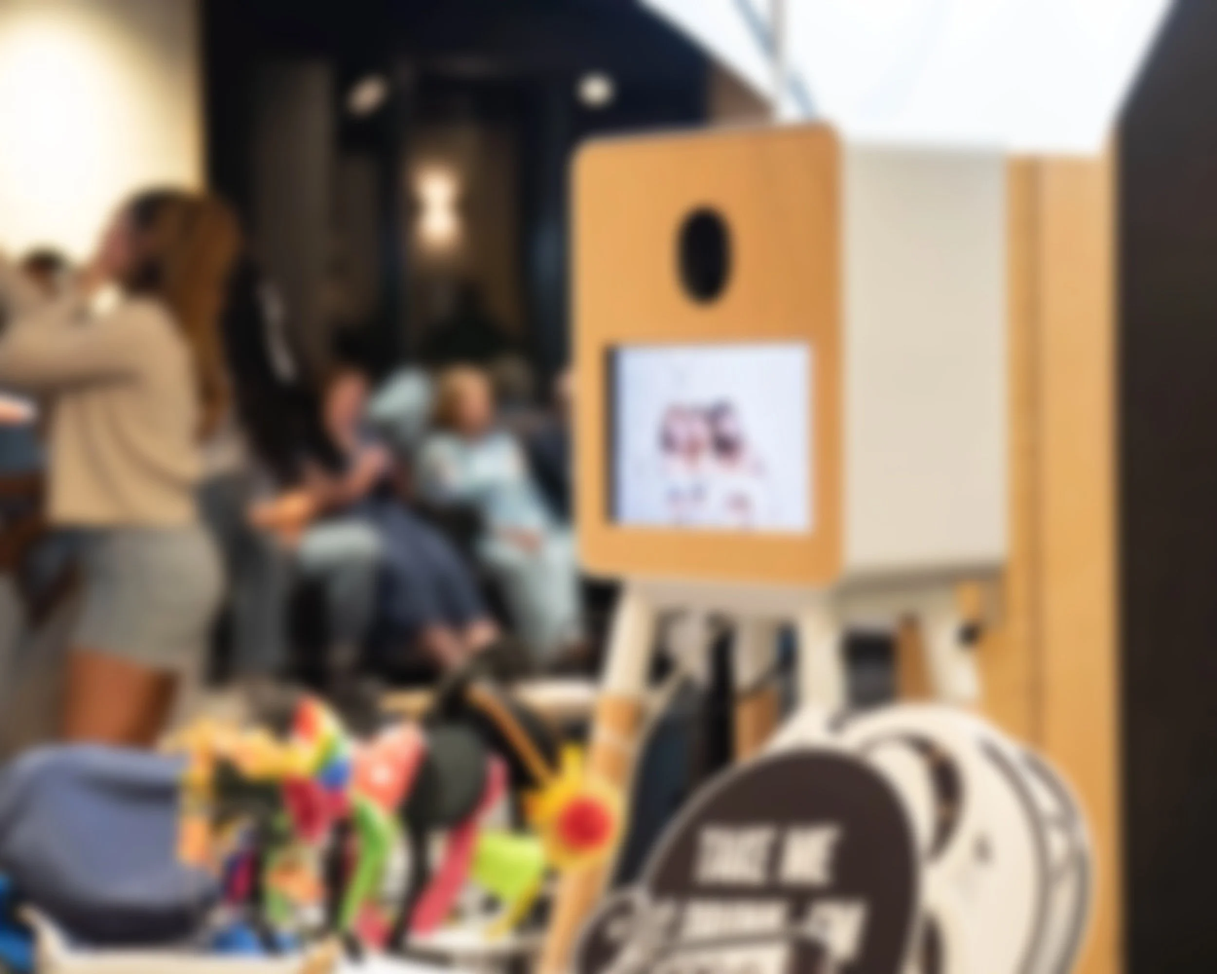 “Photobooth prints and digital copies displayed on a table for guests