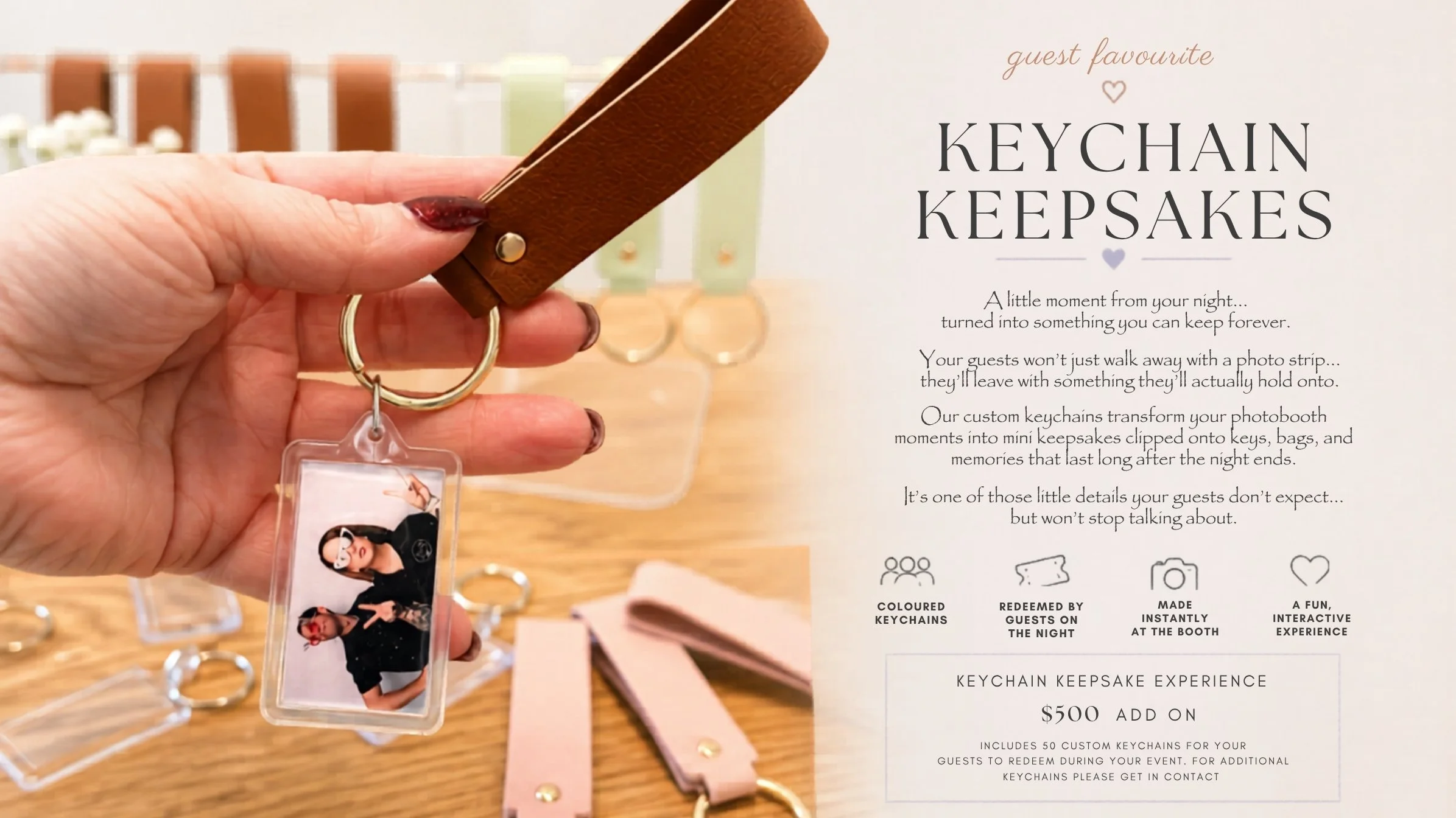 Close-up of a hand holding a brown leather keychain with a photo ID tag attached, with a blurred sign in the background that advertises custom keychain keepsakes.