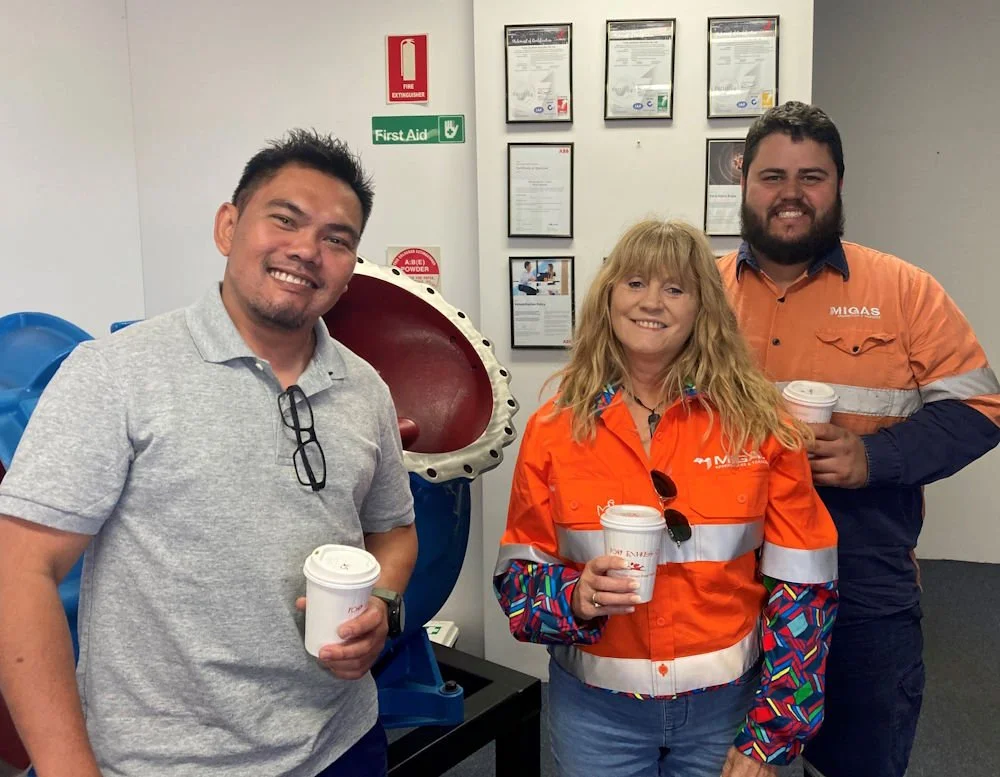 MIGAS field officer with Turbo Systems Australia supervisor and apprentice