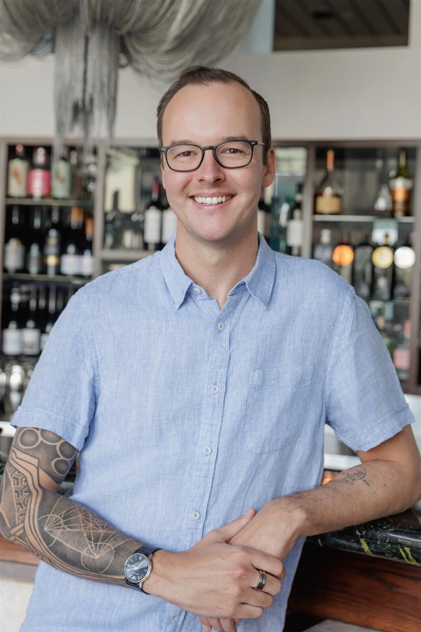 A smiling picture of Lucas Vetter in a relaxed environment. He is the Owner and Director of Bite Me Biscuits.