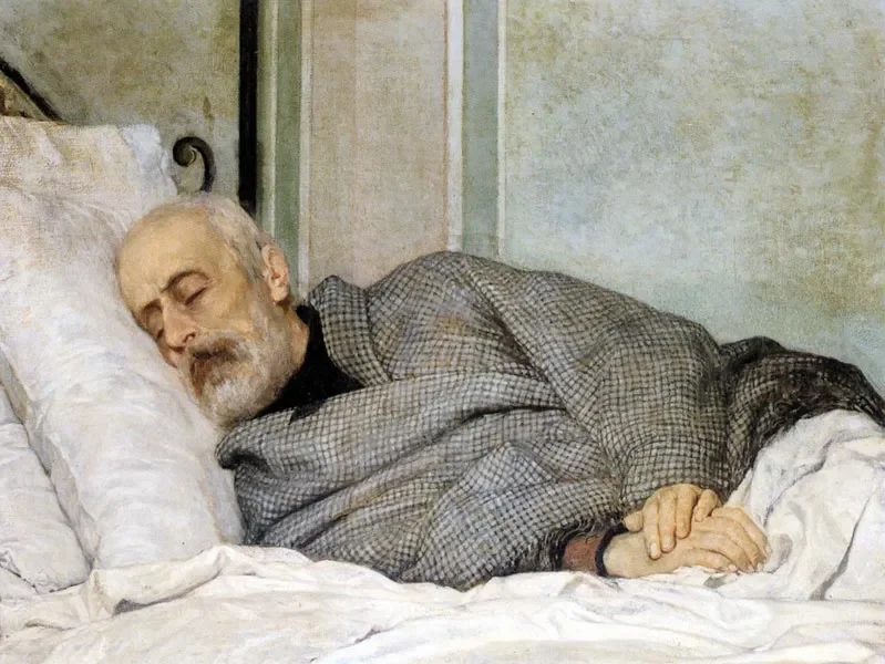 An elderly Giuseppe Mazzini with a gray beard sleeping peacefully on a bed, resting his head on a white pillow with his hands clasped together.
