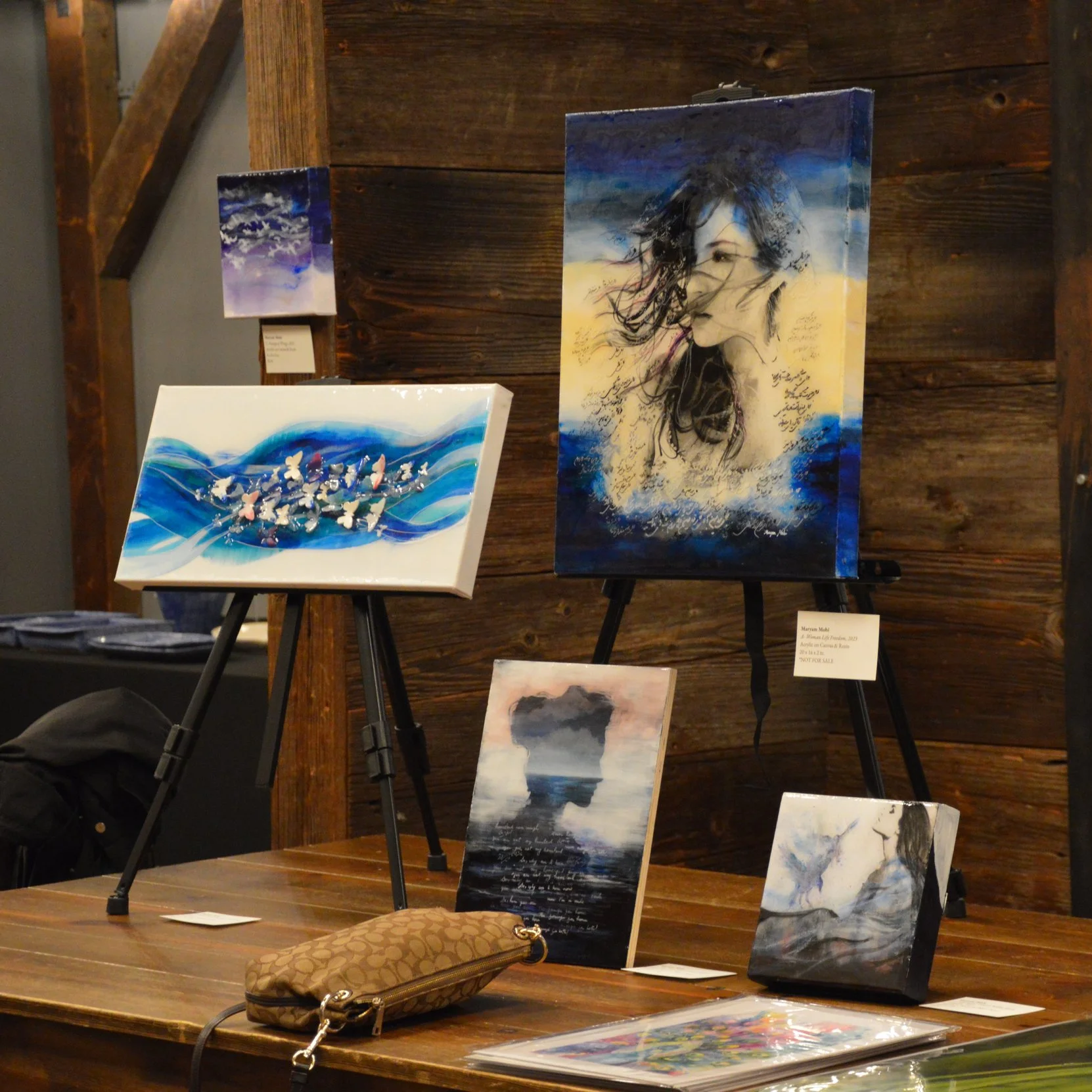 Paintings by Iranian Maryam Mohi at Middle Eastern Arts Collective inaugural art gallery in Alexandria, Virginia, USA.
