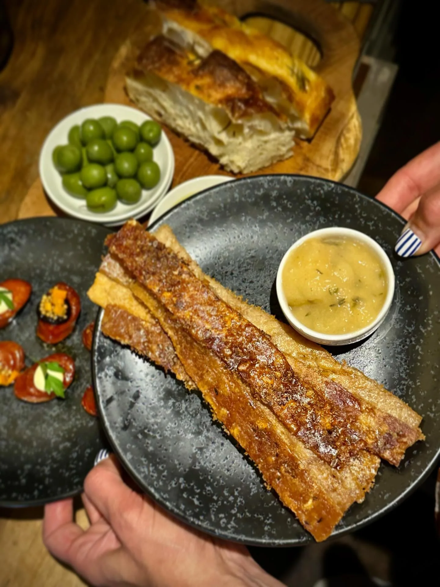 ✨ New to the Nibbles Menu! ✨
Super Crispy Pork Crackling Strips
Our take on the classic pub favourite &mdash; these golden, perfectly crispy pork crackling strips are served with a generous side of homemade apple sauce for the ultimate sweet-and-savo
