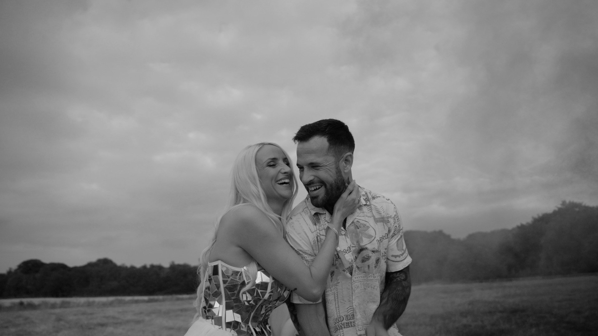 Rachel & Jamie embracing each other at their wedding