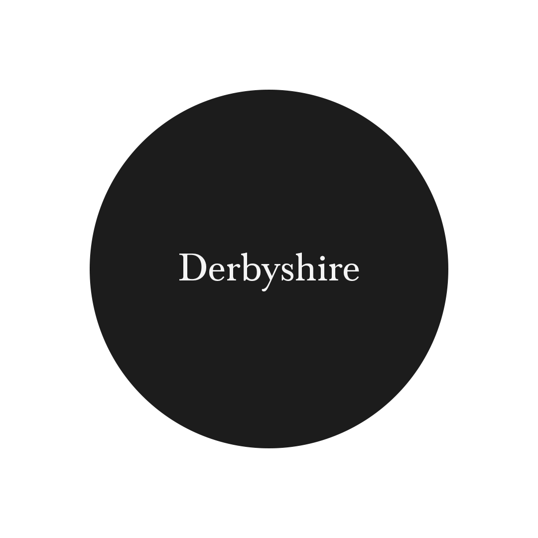 Black circle with the word Derbyshire inside it