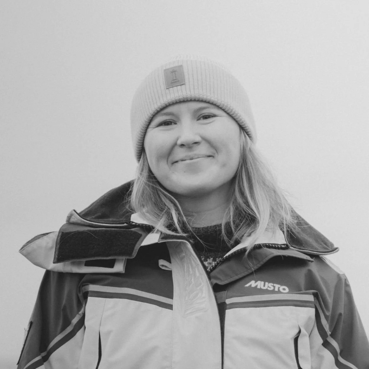 Woman in sailing clothing.