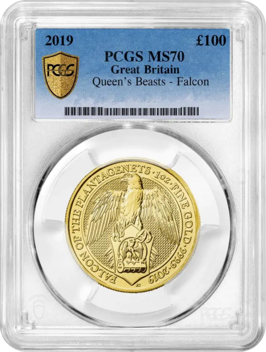 Gold coin featuring a falcon and shield, graded PCGS MS, from Great Britain, Queen’s Beasts series, encased in a clear protective slab.