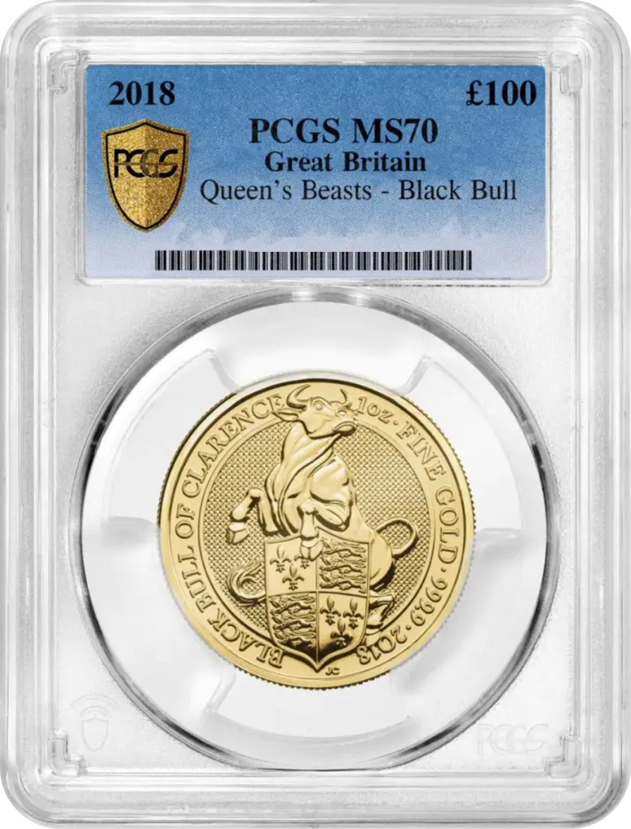 Gold coin featuring a lion in armor, shield emblem, and inscriptions from the Queen's Beasts collection, encapsulated in a clear protective case with a blue label indicating grading details.