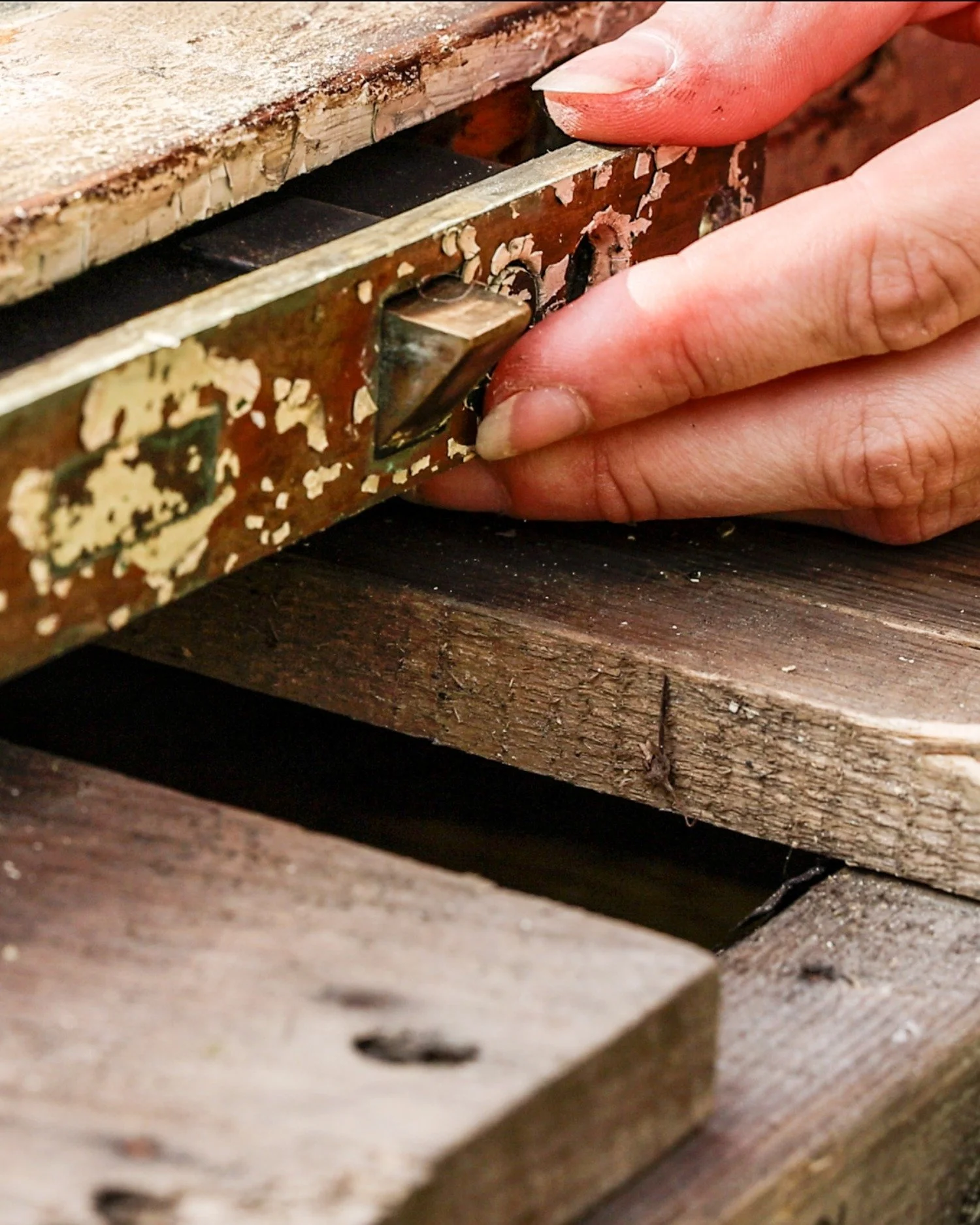 This original mortise lock had seen better days, but it wasn&rsquo;t beyond saving.  We carefully disassembled, cleaned, repaired, and reinstalled the 100-year-old mechanism. Bringing it back to a smooth, working order without replacing its historic 
