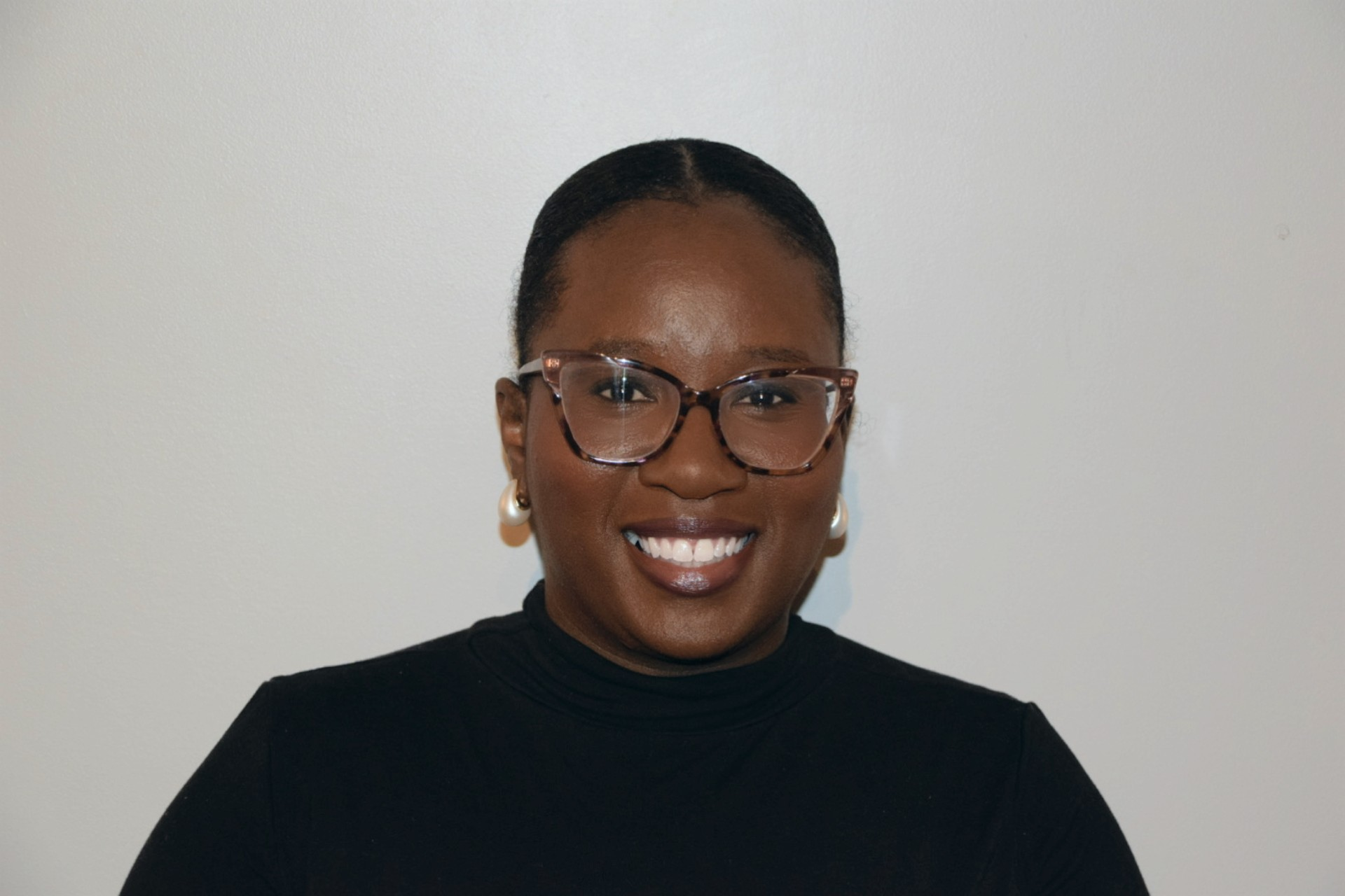 Headshot of Dannie Aldinor