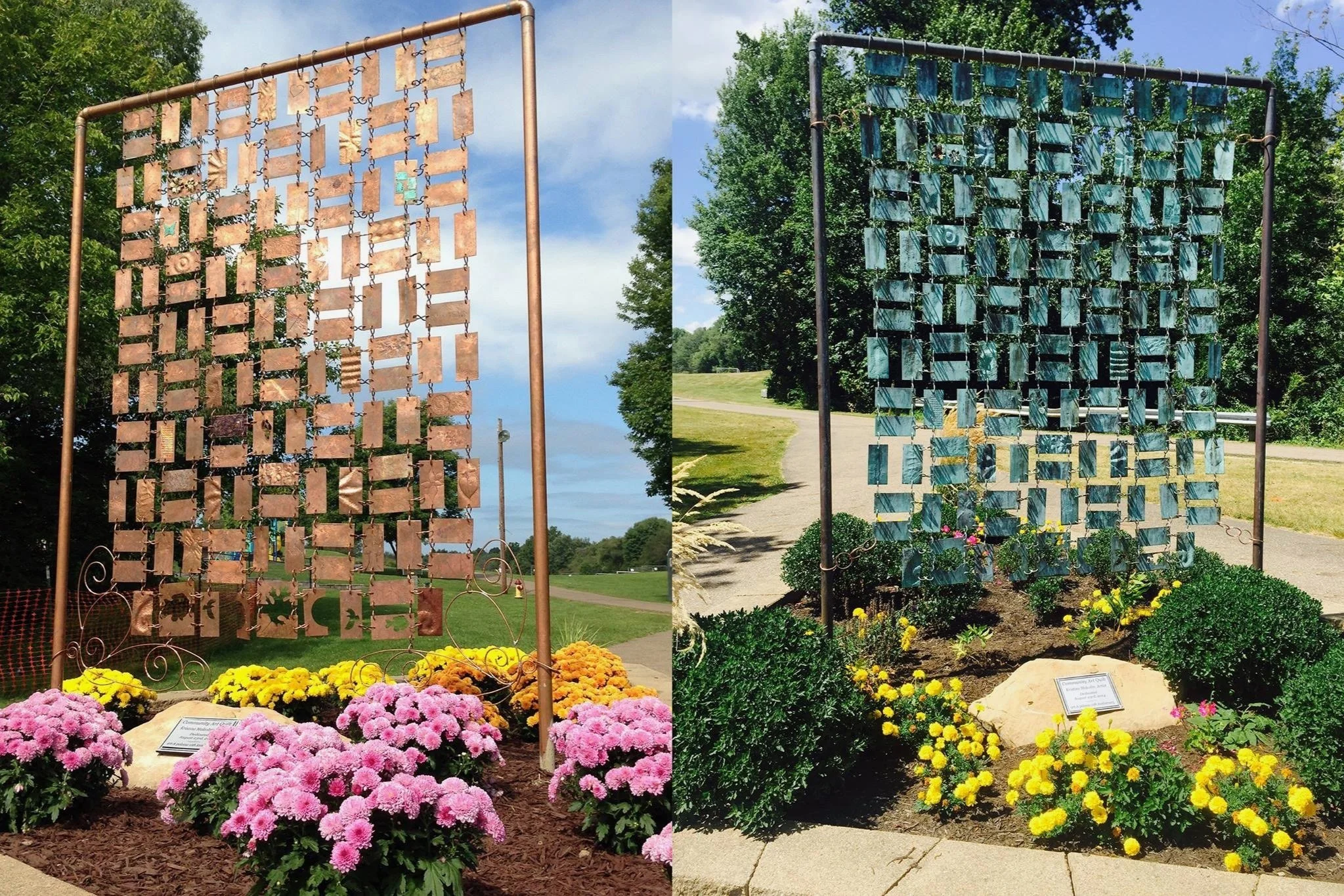 A side-by-side comparison of two metal memorials hanging on a stand, surrounded by colorful flowers with a park and trees in the background on a sunny day. The left memorial has a rusty appearance, while the right one is painted blue-green.