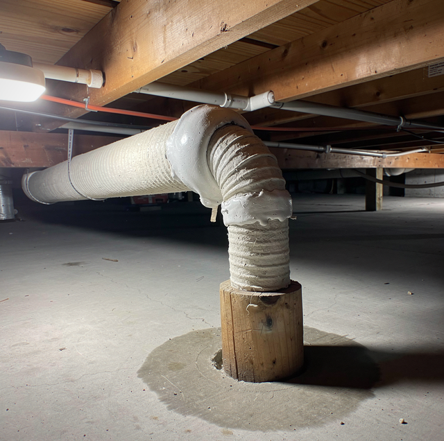 White asbestos pipe wrap lifting at seam