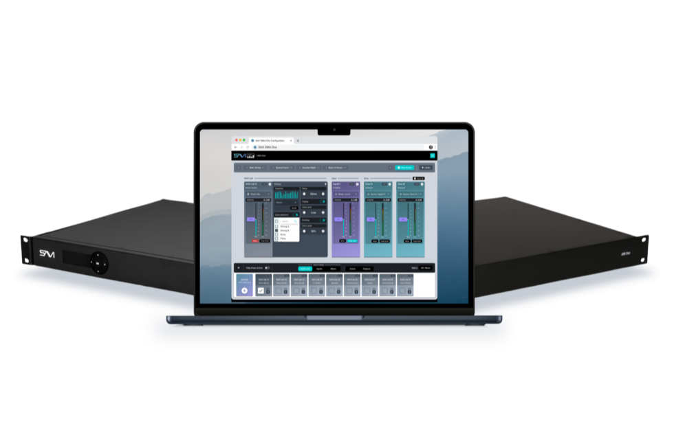 A laptop and two audio hardware units with a digital audio workstation software displayed on the laptop screen.
