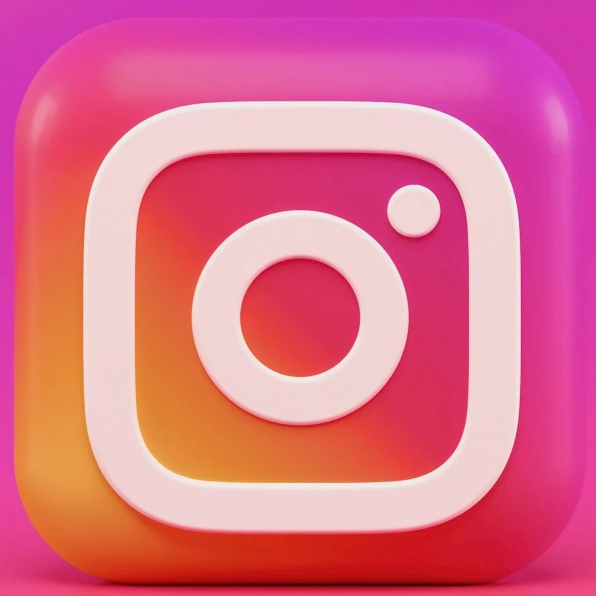 Pink and orange Instagram app icon with a white camera outline on a gradient background.