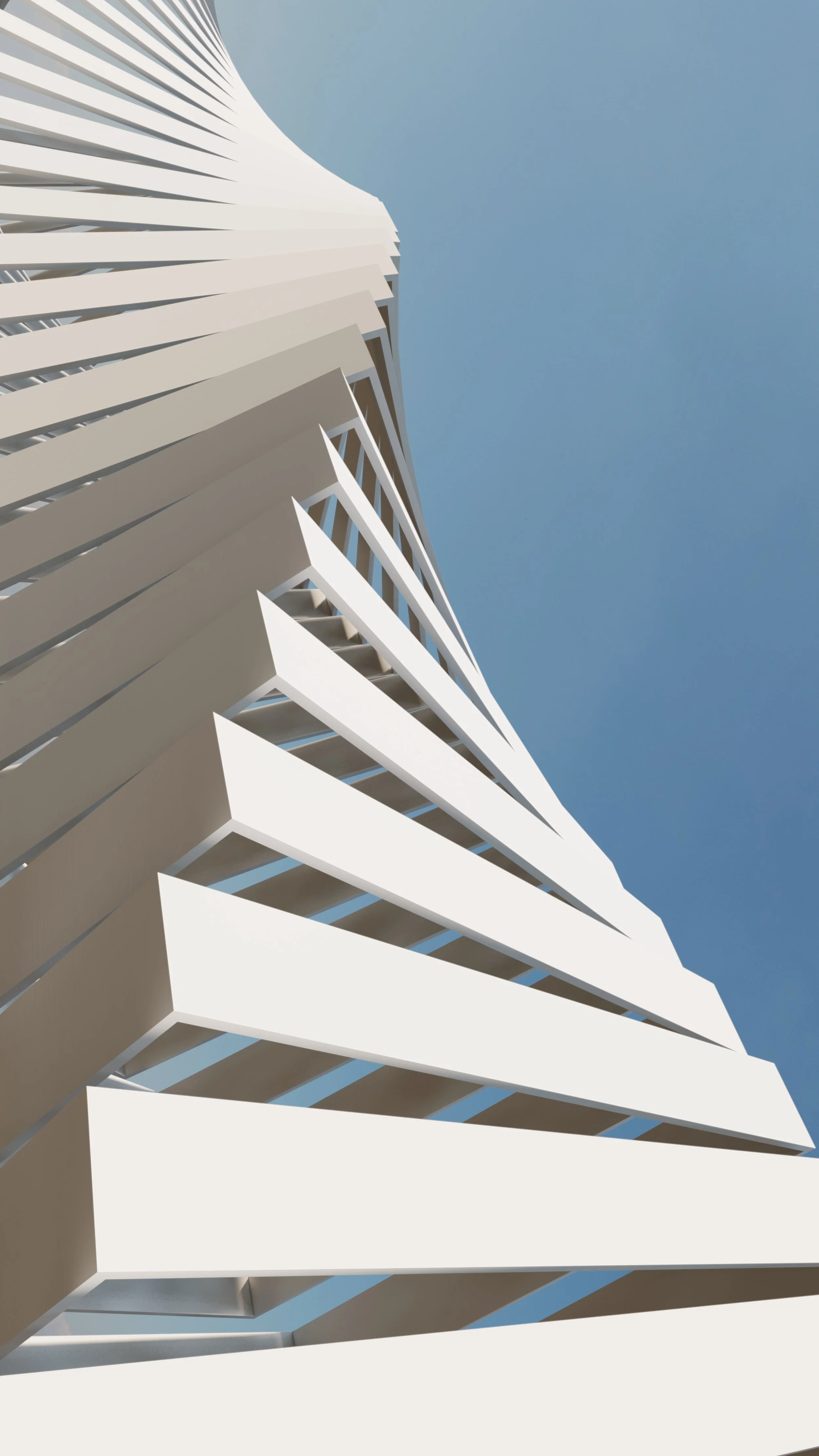 Low-angle view of a modern white building with a twisting design against a blue sky.