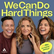 Group of three people smiling, with yellow text reading 'We Can Do Hard Things'.