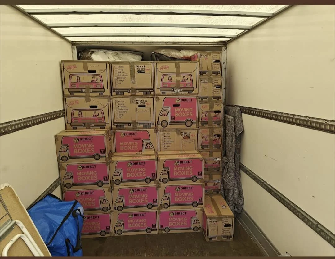 Moving boxes professionally loaded and stacked inside one of our Luton vans during a long-distance house removal from Chiswick, London to Bristol. Our experienced movers carefully maximise space while keeping belongings secure throughout transit.