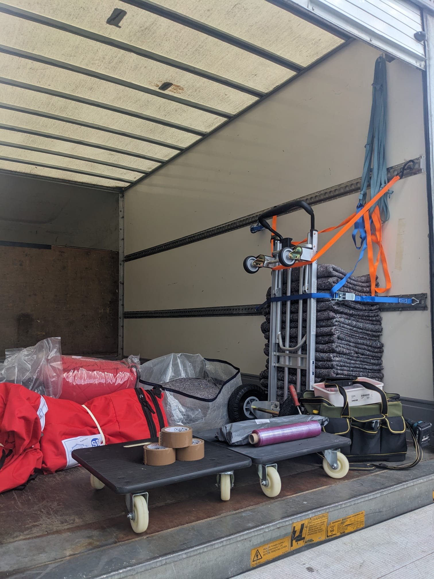 Image of equipment used on removal jobs inside the Luton Van owned by Ready To Go House Movers And Removals.