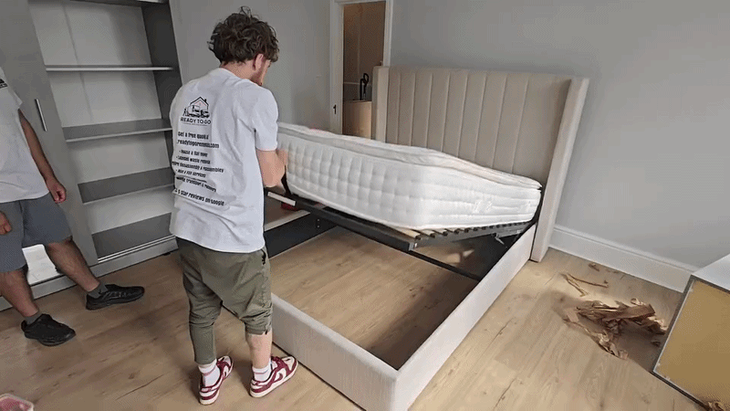 Ready To Go Removals gif of Ottoman bed being disassembled then reassembled being tested to make sure it works from the team at Ready to go house movers and removals 