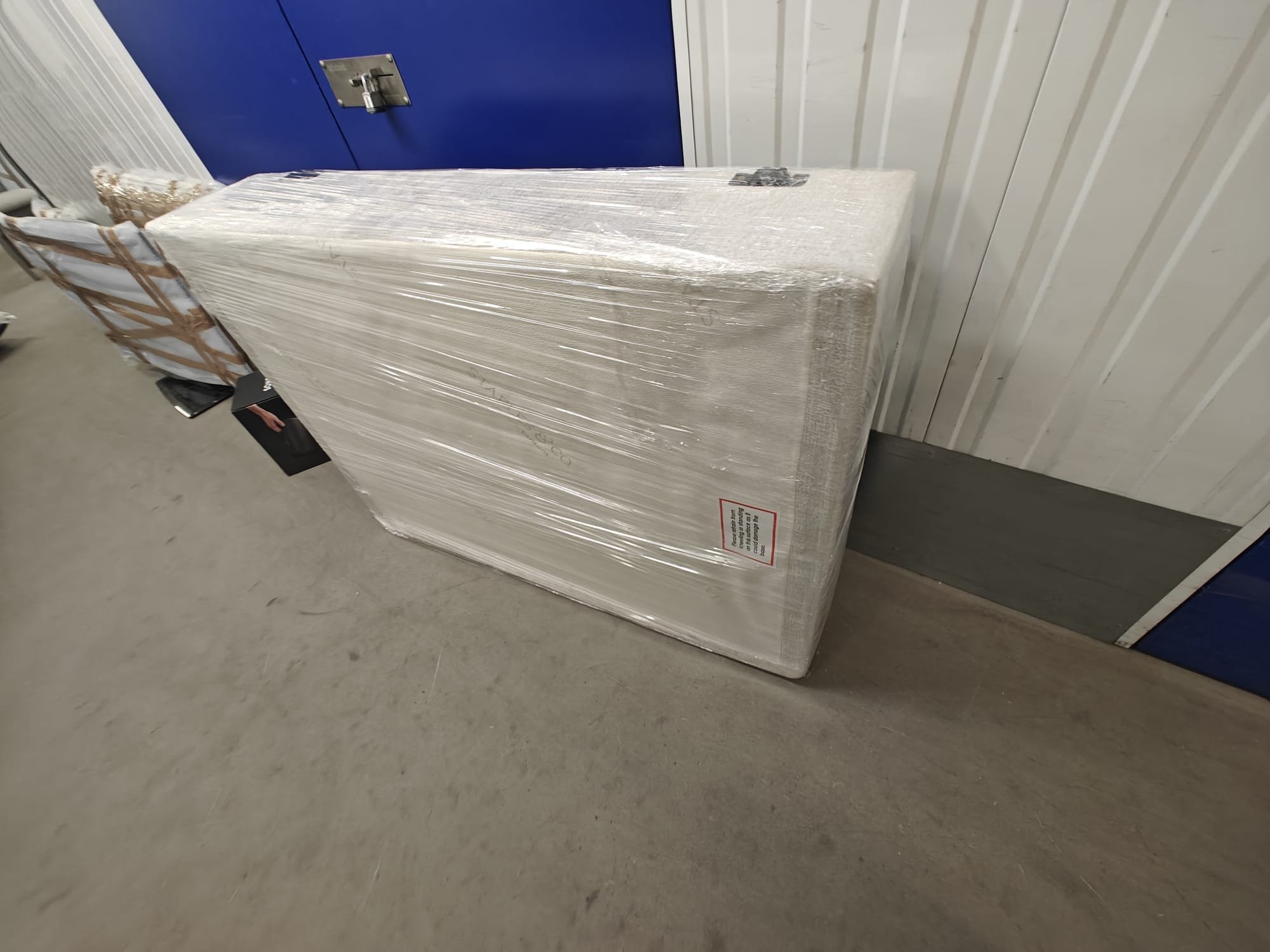 saran-wrapped-protected-sofa-base.jpeg
