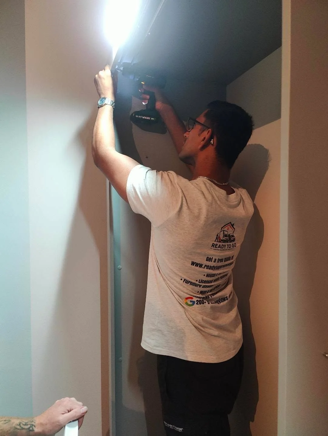 Wardrobe being put back together by Ready to go house movers and removals. Done during a house moving job from West Hampstead to Hampstead Heath. In NW London. Ready To Go Removals