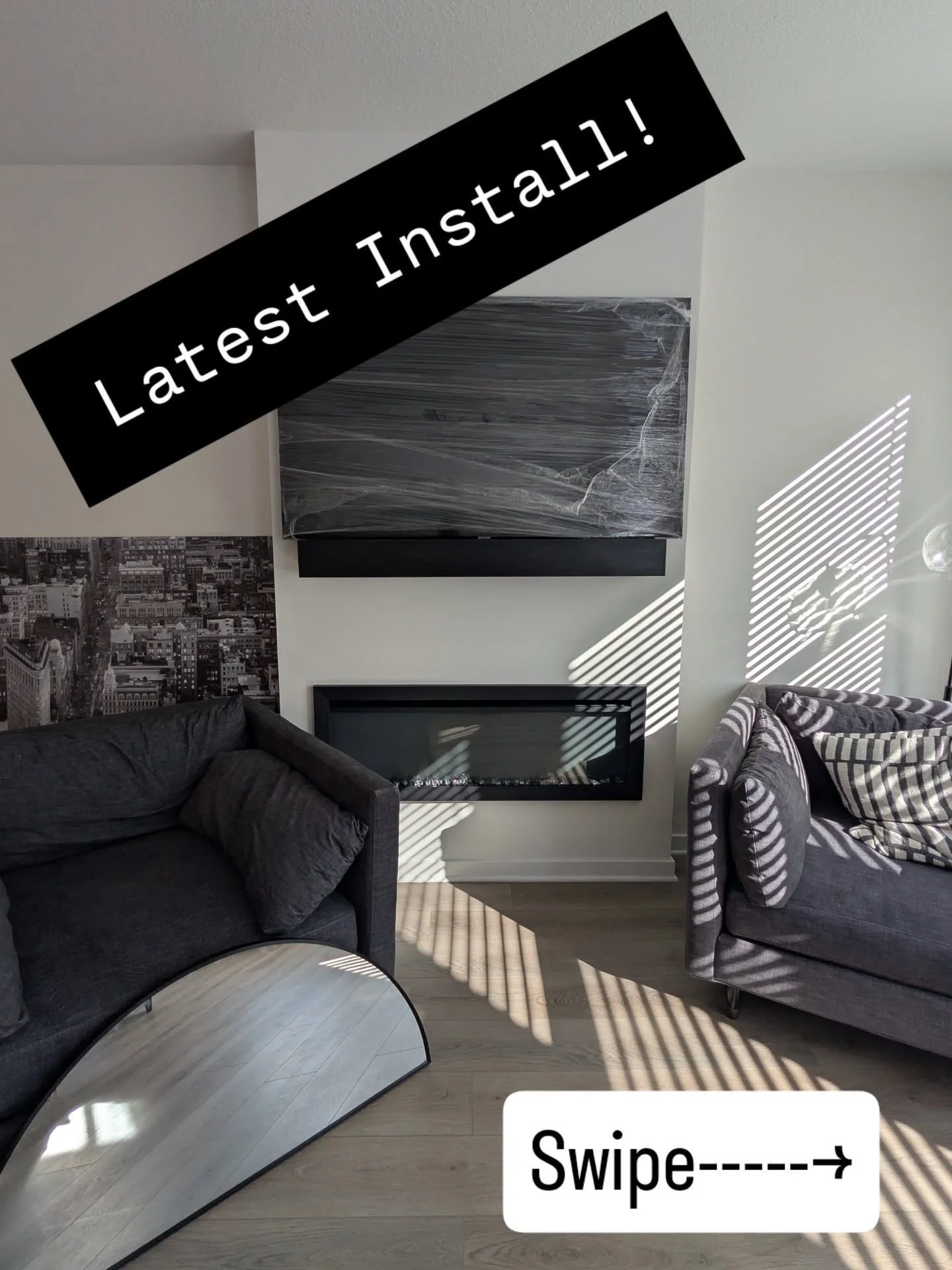 Just wrapped up this custom fireplace refresh. We took this plain wall and transformed it with floor-to-ceiling black shiplap to create a bold, modern focal point. Mounting the TV really pulled the whole look together.

​Swipe to see the before and a