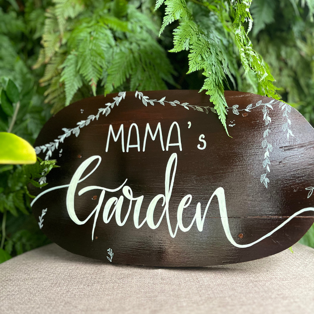 calligraphy wooden garden sign.png