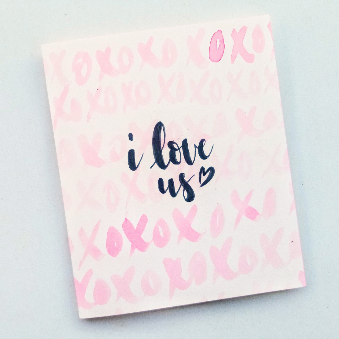 I love us xo calligraphy greeting card.png