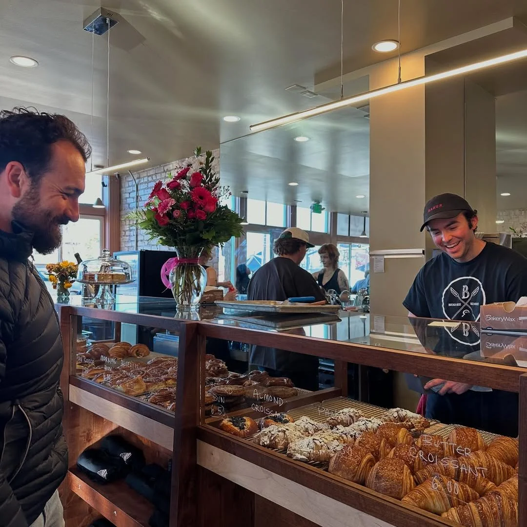 Customers at the All Purpose Bakehouse pastry case