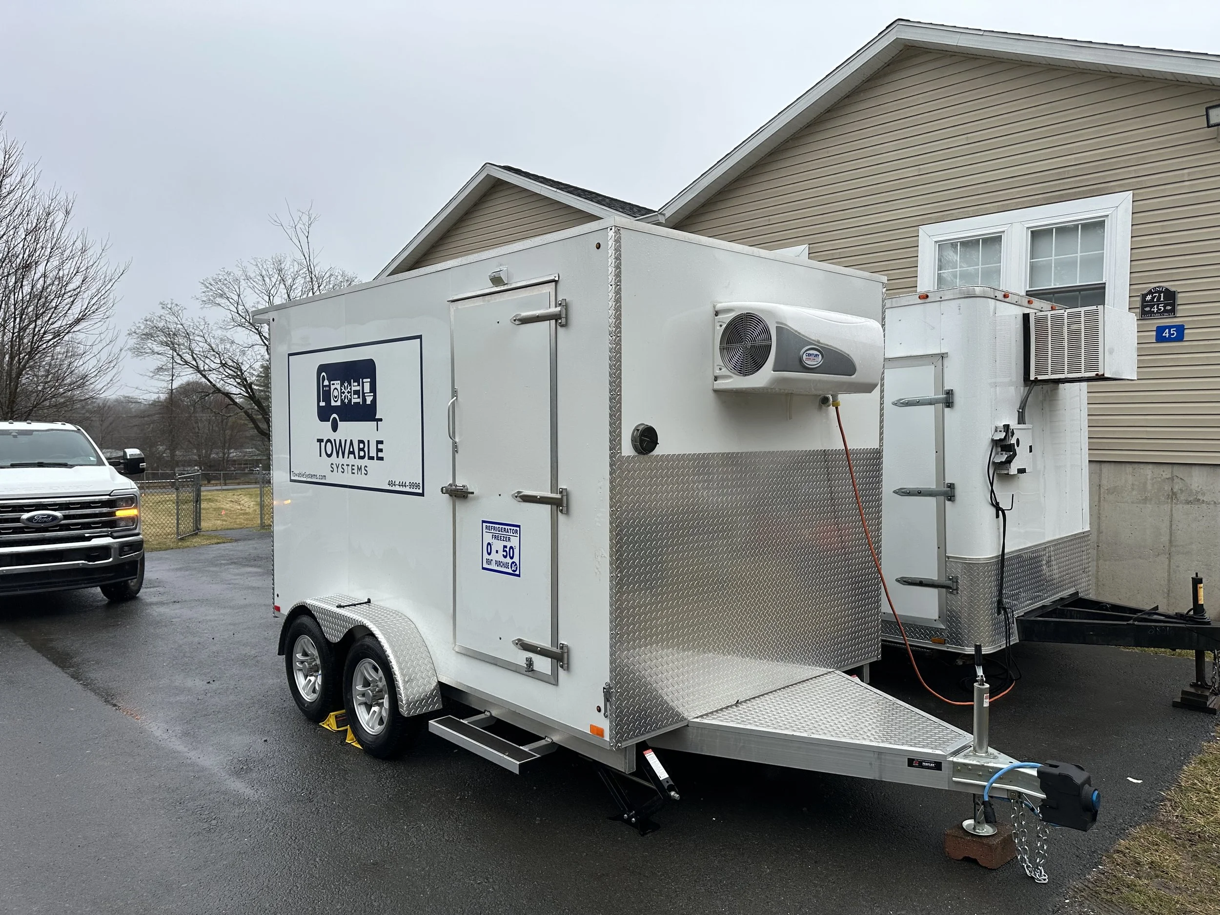 12-foot freezer trailer rental by Towable Systems delivered to an event site in Fallsburg, New York.