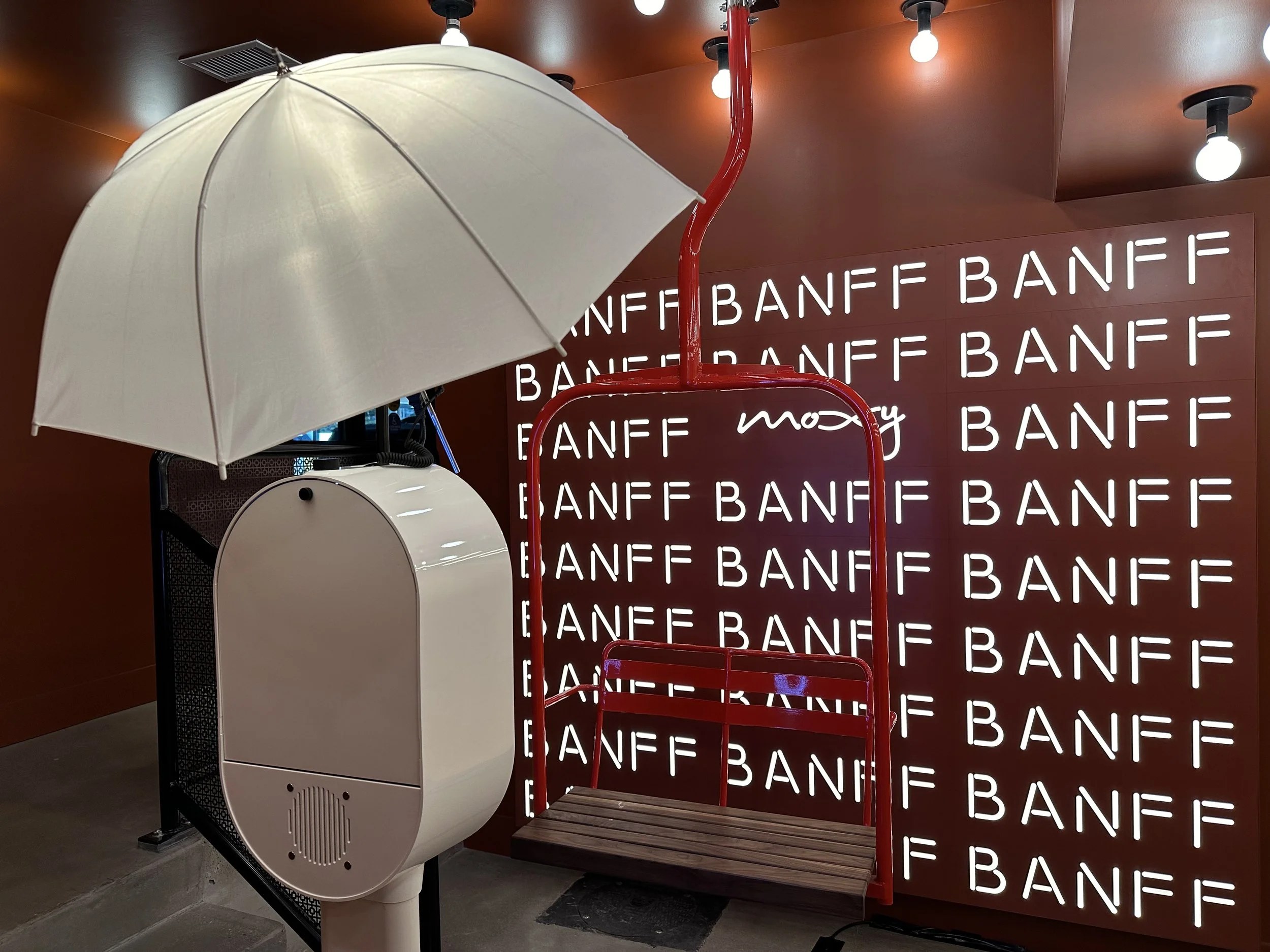 Case Study: How a Branded Print Booth Turned a Neon Wall Into a Social Moment For The Moxy Banff Grand Opening