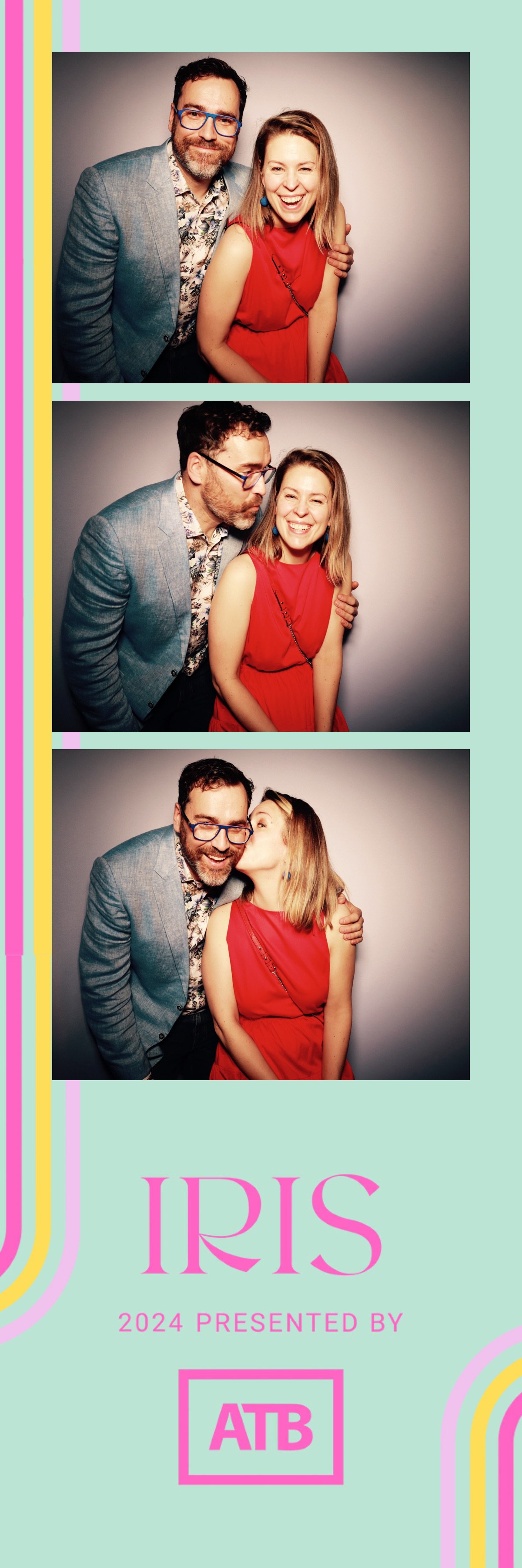 Photo booth strip featuring three pictures of a man and a woman. In the first, they stand close, smiling at the camera; in the second, the man leans toward the woman, laughing; in the third, they share a kiss on the cheek. The woman wears a red dress