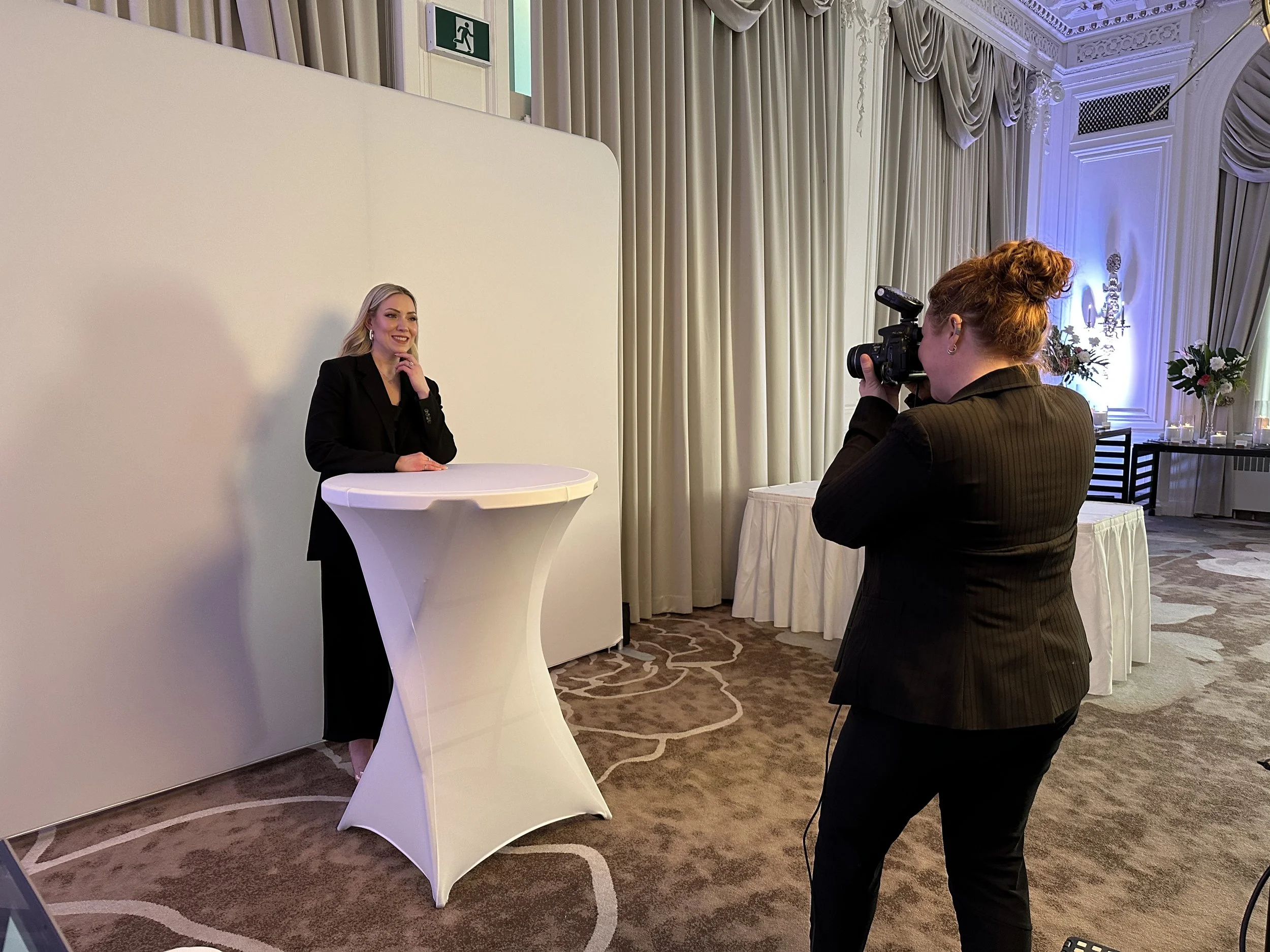 a studio photographer captures portraits at a black tie gala in Calgary