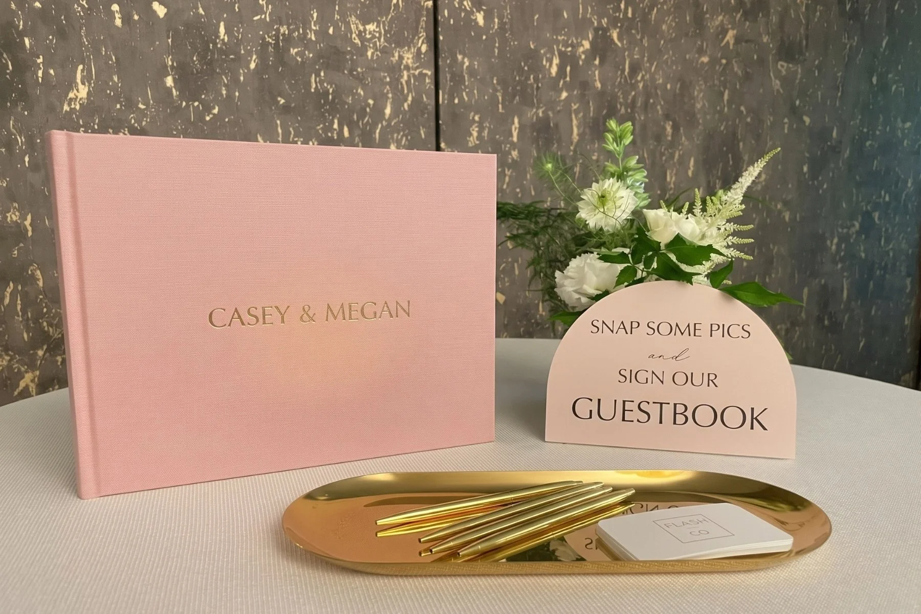 A custom embossed photo booth guestbook at the Pomeroy Kananaskis mountain lodge