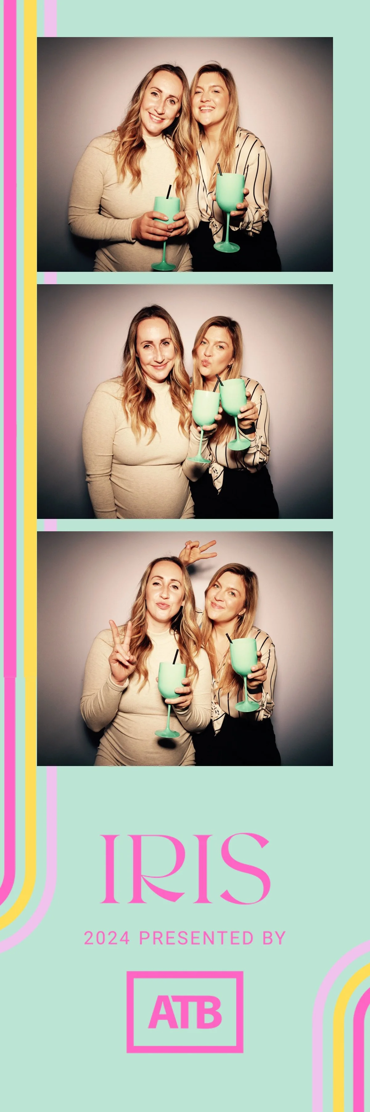 Three women with light skin smiling and making playful faces in a photo booth, holding blue drinks with black straws, against a plain light gray background. The bottom part of the image features pink and pastel-colored text and design elements.