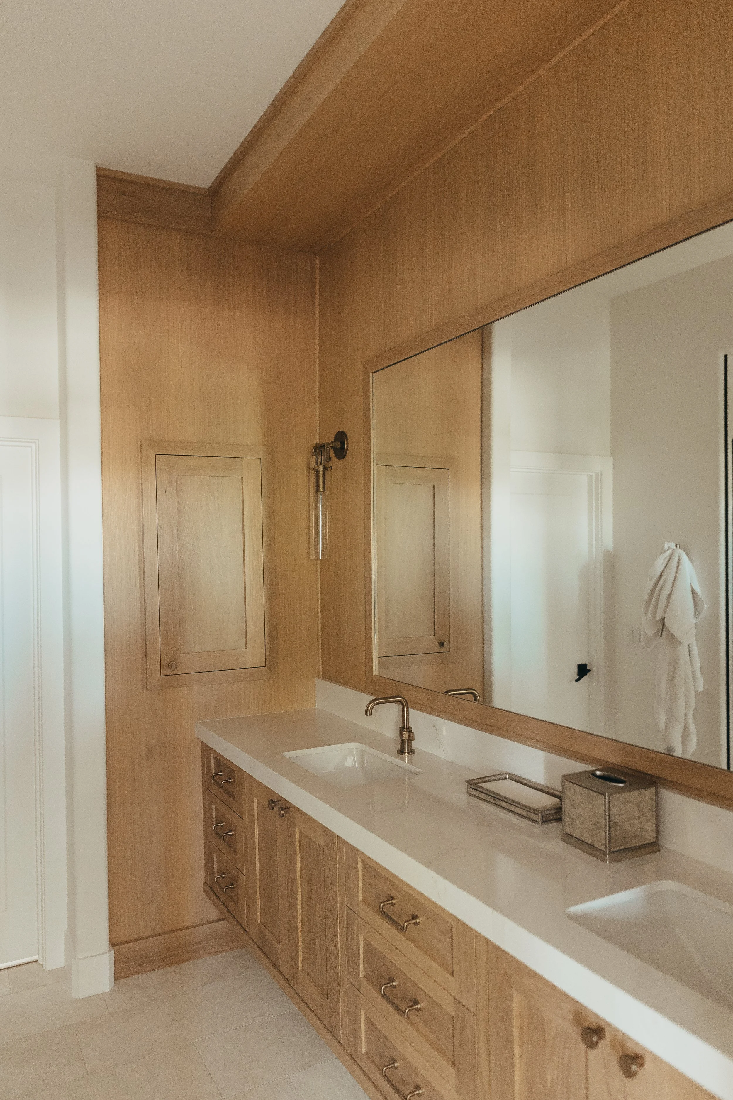 Bathroom wall panels with built in custom white oak medicine cabinet