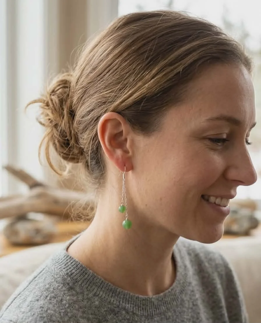 Jade Dangle Earrings On A Woman.jpg