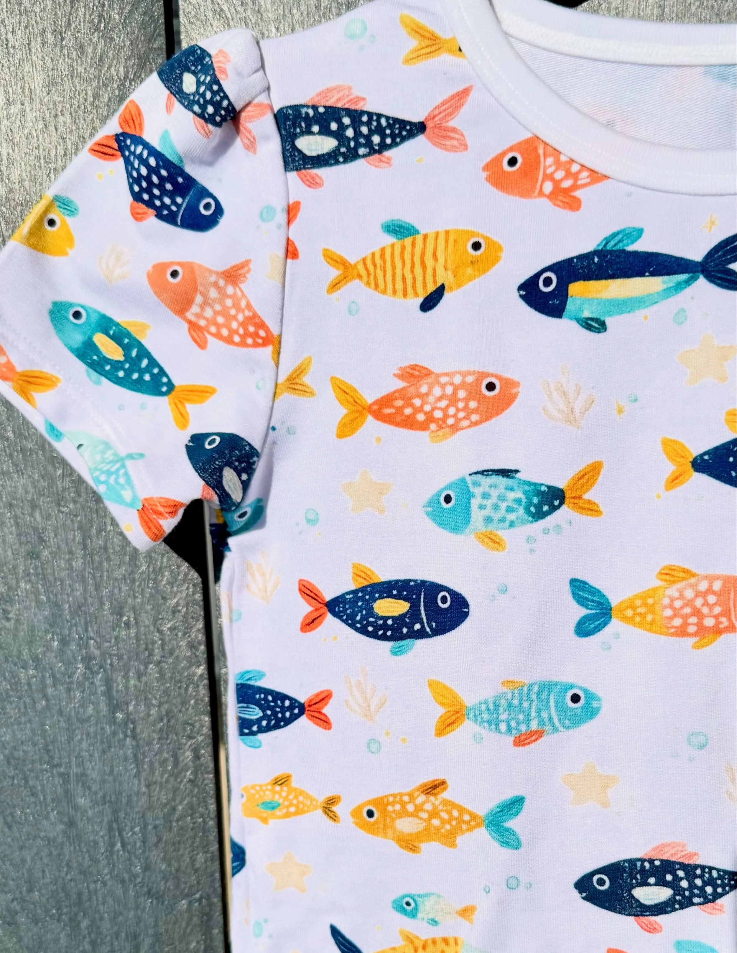 Tiny Tides 🌊🐟

A playful sea of colorful little fish made for sunny beach days, sandy toes, and endless summer adventures. Soft coastal tones and whimsical details bring this print to life &mdash; perfect for your tiniest explorers.

Coming soon fr