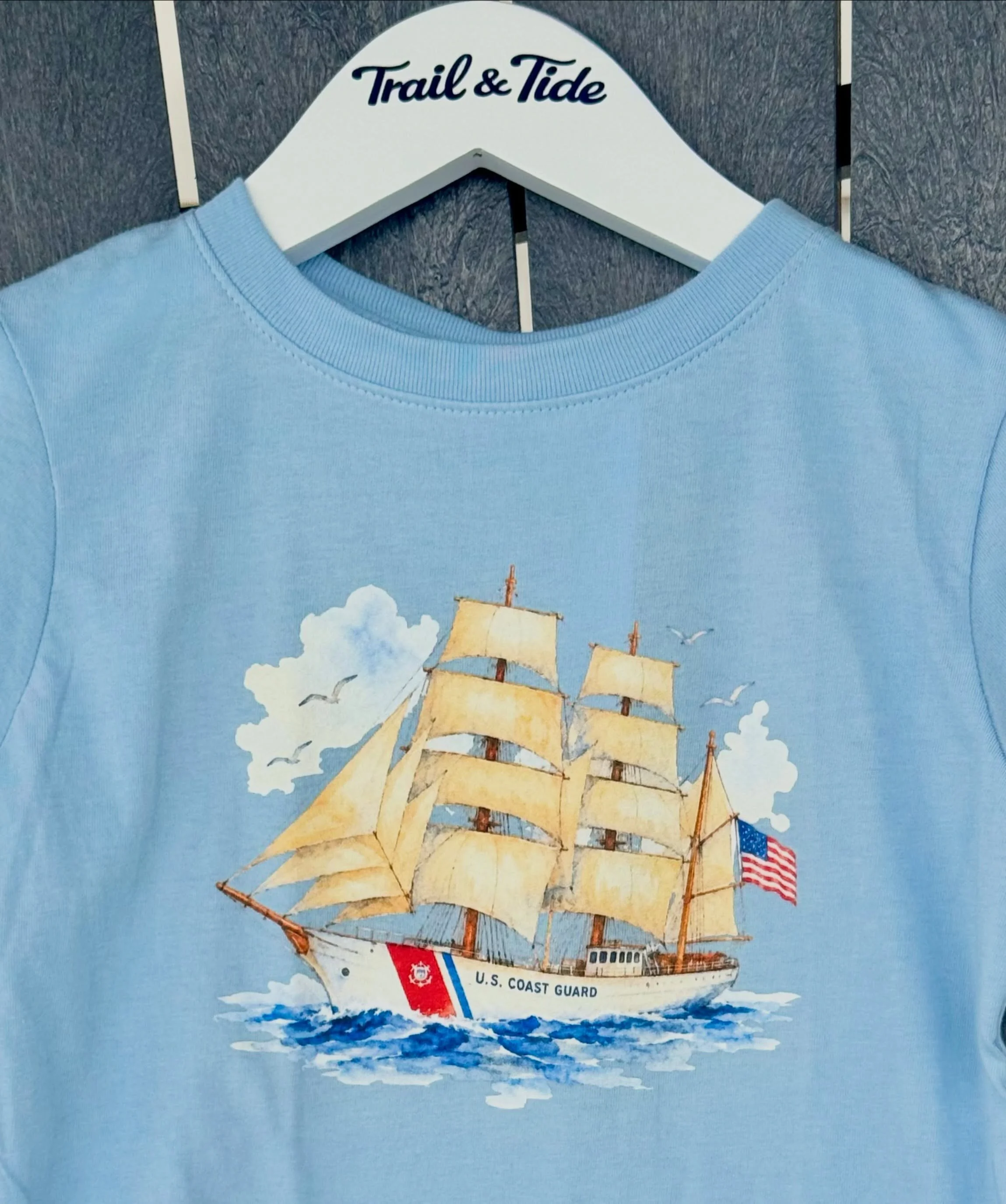 Honoring America&rsquo;s maritime spirit and 250 years of adventure, courage, and freedom. 🇺🇸⚓️

Our newest Trail &amp; Tide tee features the iconic USCGC Eagle &mdash; the legendary tall ship of the United States Coast Guard &mdash; sailing proudl