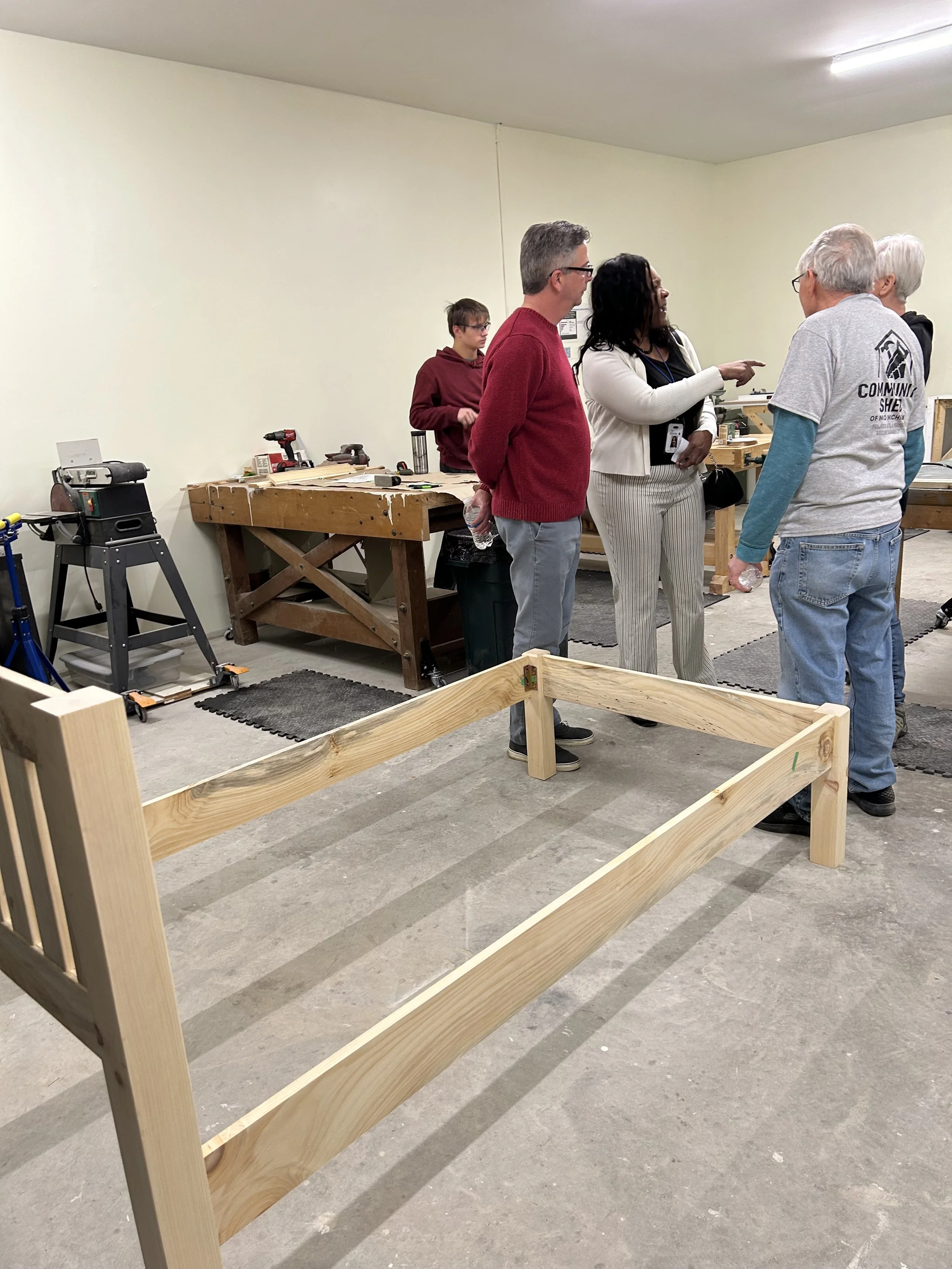 Woman drawing woodworking plans