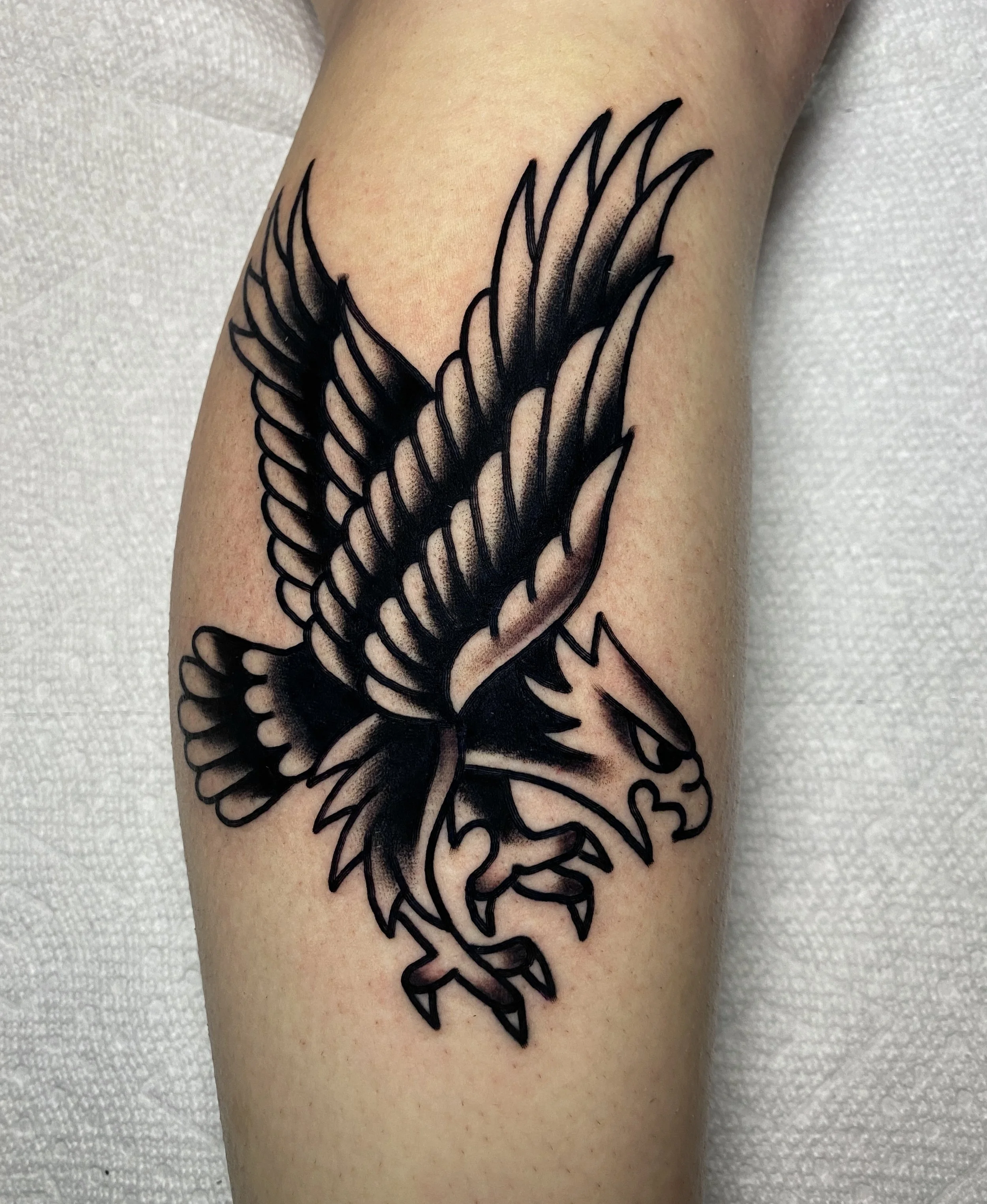 Traditional eagle tattoo done in black and grey made by Sonny Roth in Portland Maine