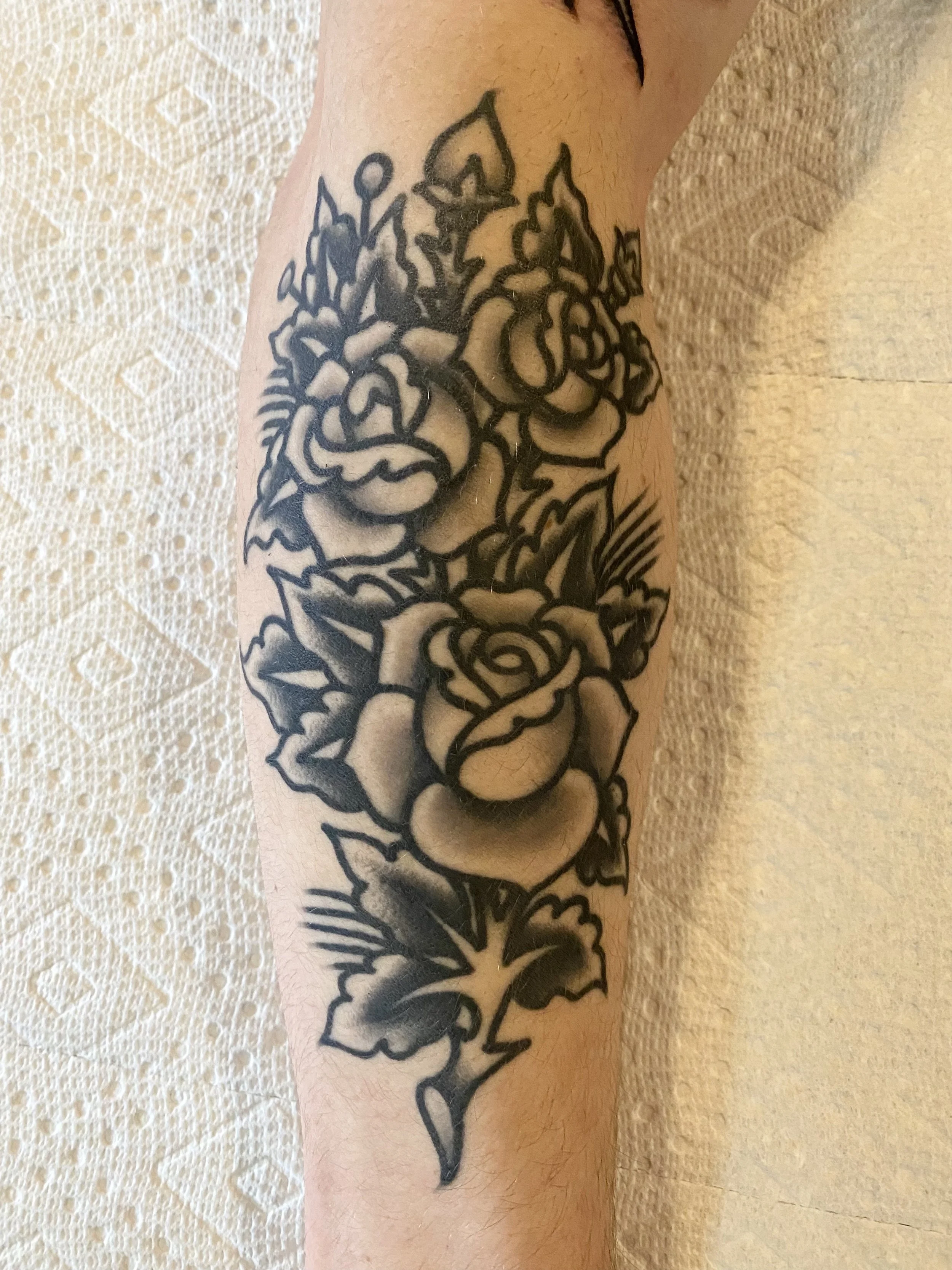Healed black and grey traditional roses