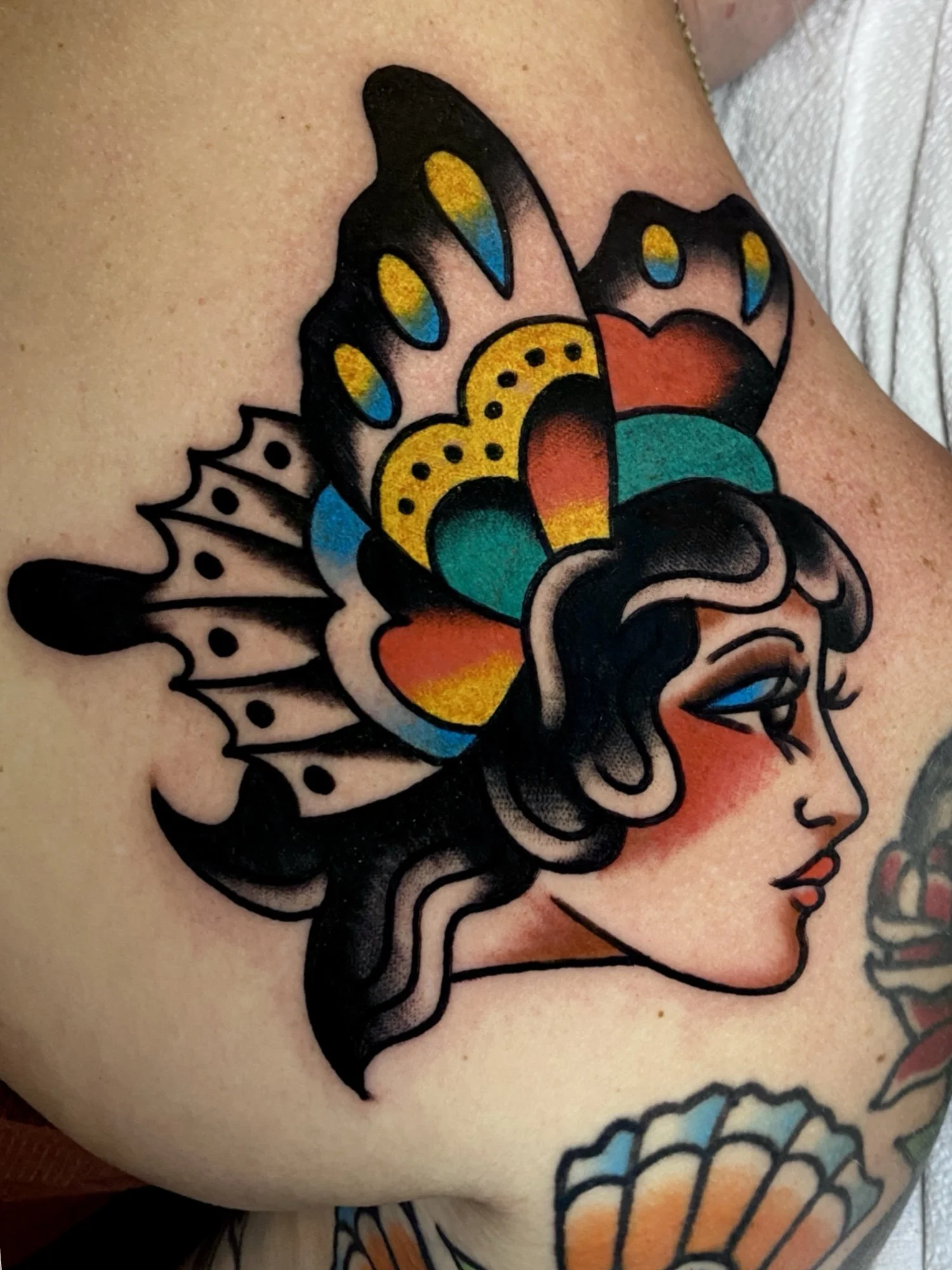 lady head with butterfly wings by Portland Maine tattoo artist Sonny Roth
