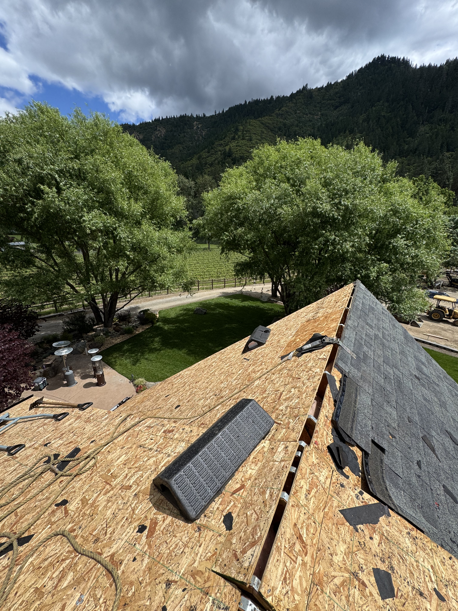 Elite Roofing Solutions crew on a residential roof installation