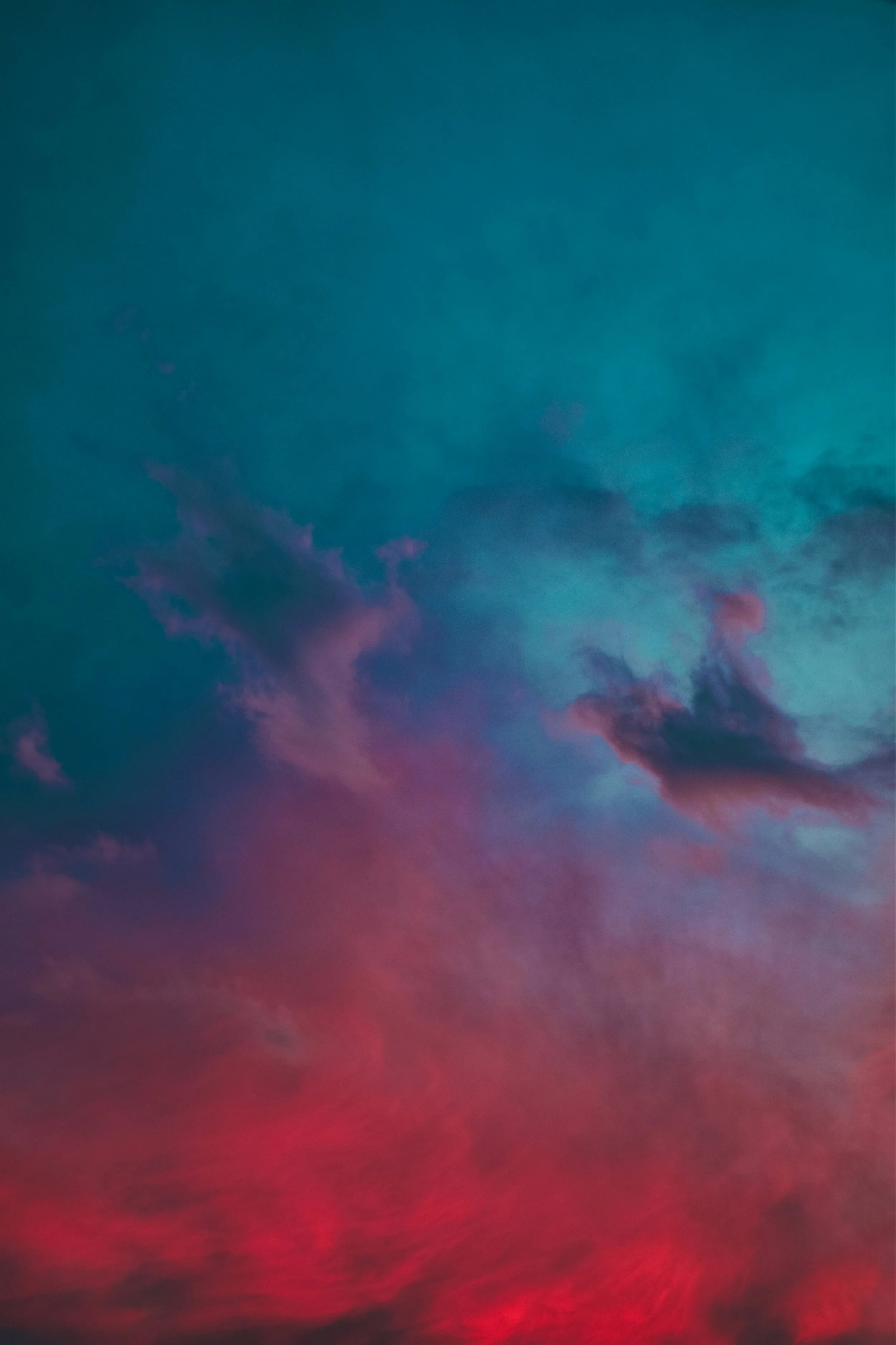 Colorful sky with blue, purple, and pink clouds.