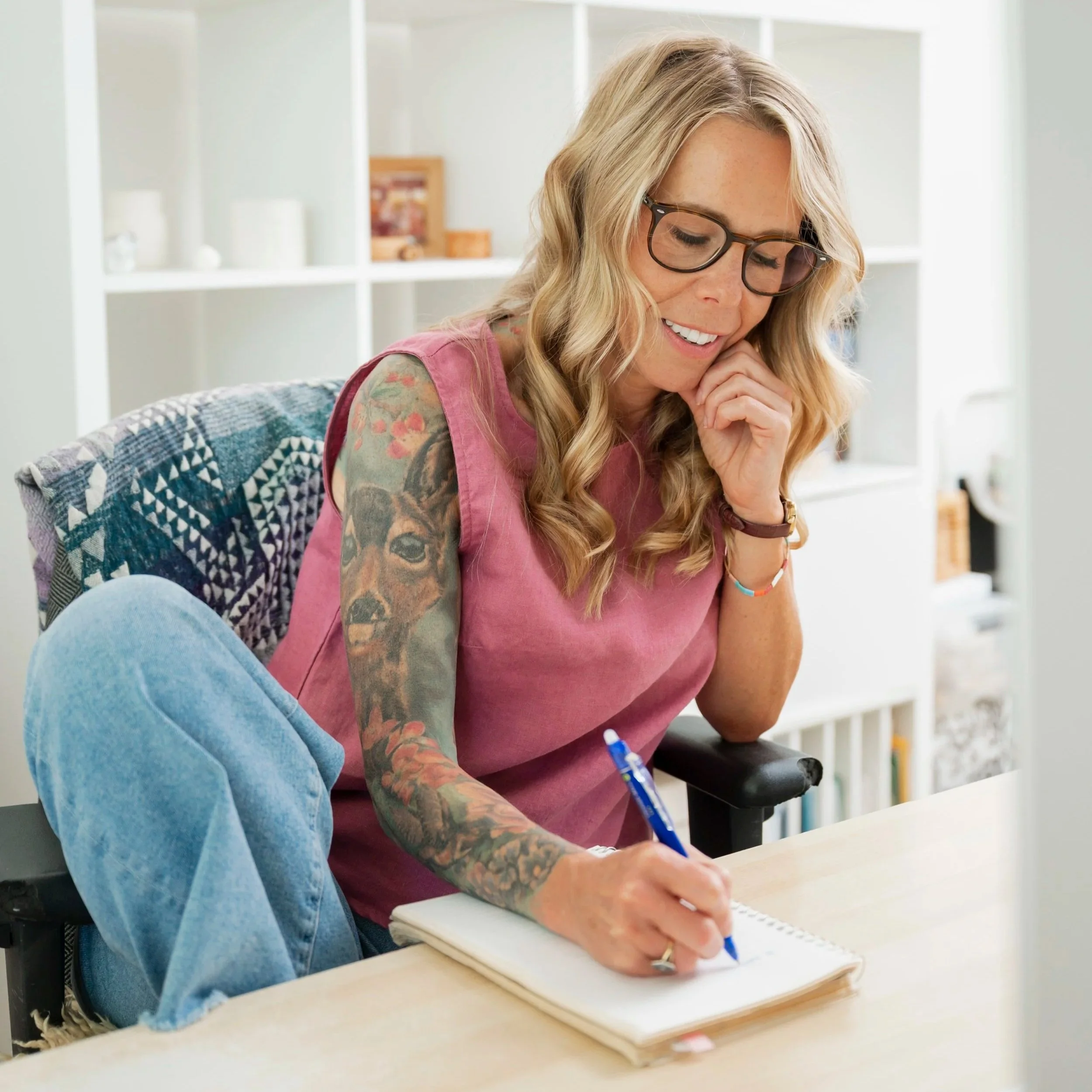 Deanna Smith, RTC, writing notes for a counselling blog